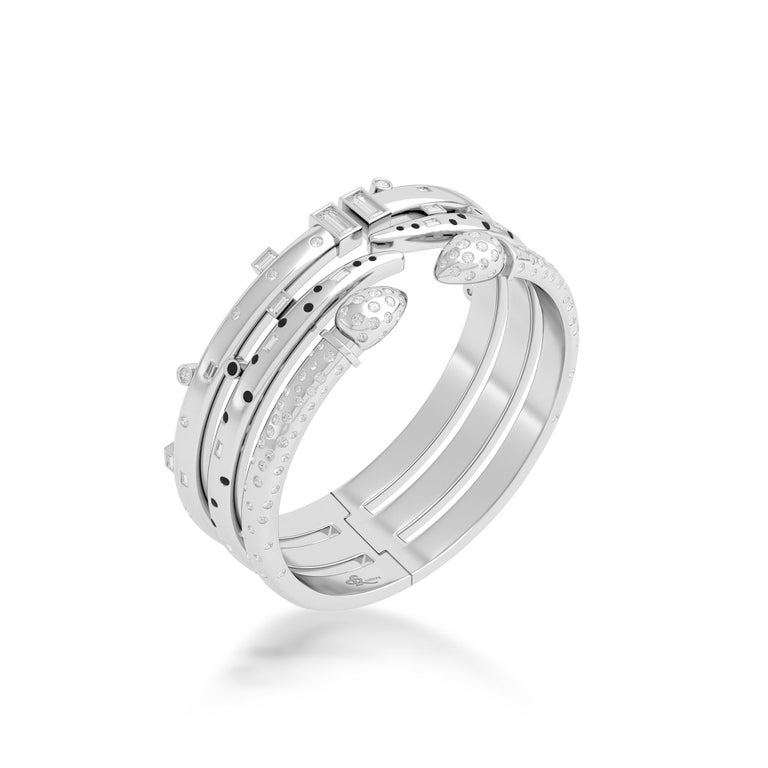 Ruben Manuel Designs “Winter” Bracelet.  18K WG, 3 in 1 bracelet set w/VS white round & baguette diamonds, featuring round black diamonds.