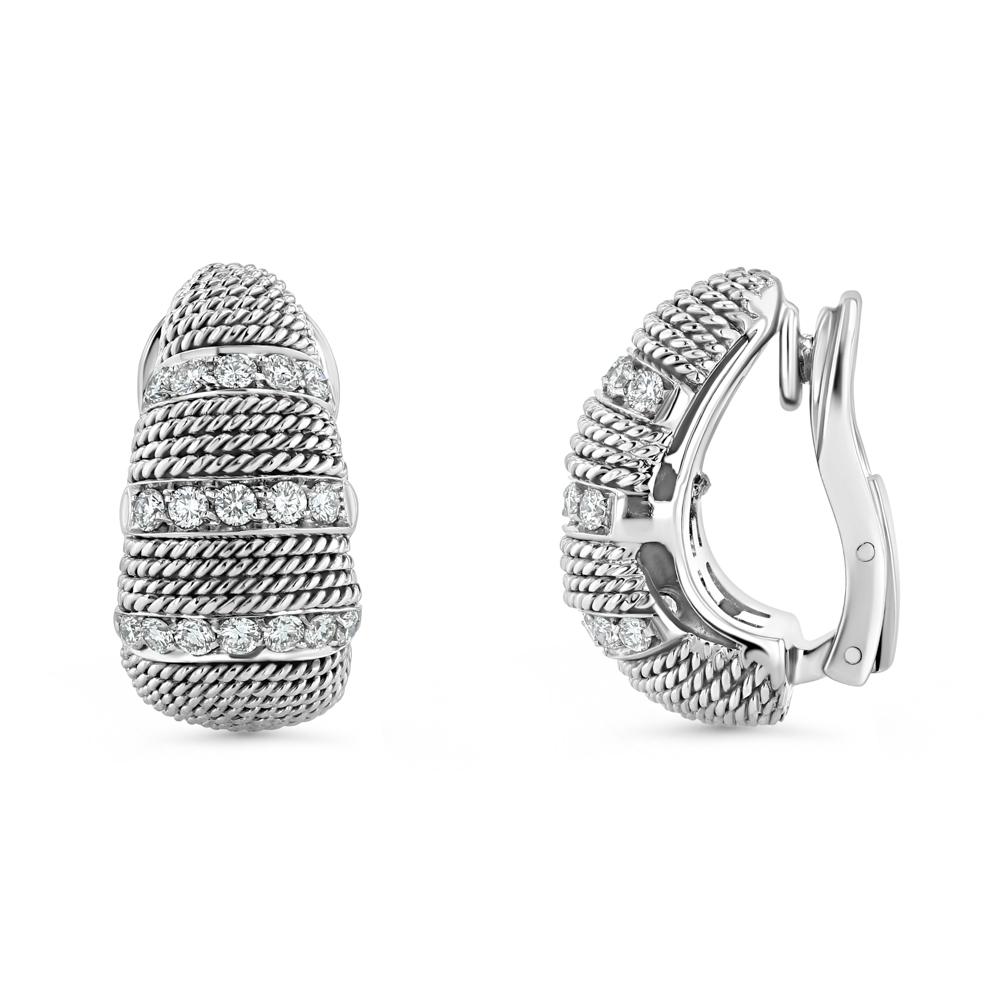 This vintage Borsheim 18k white gold and diamond clip earrings consists of alternating horizontal rows of individually prong pave diamonds and twisted wires cover the clips. 

This set also matches our 18k White Gold and Diamond Tassel Pendant
