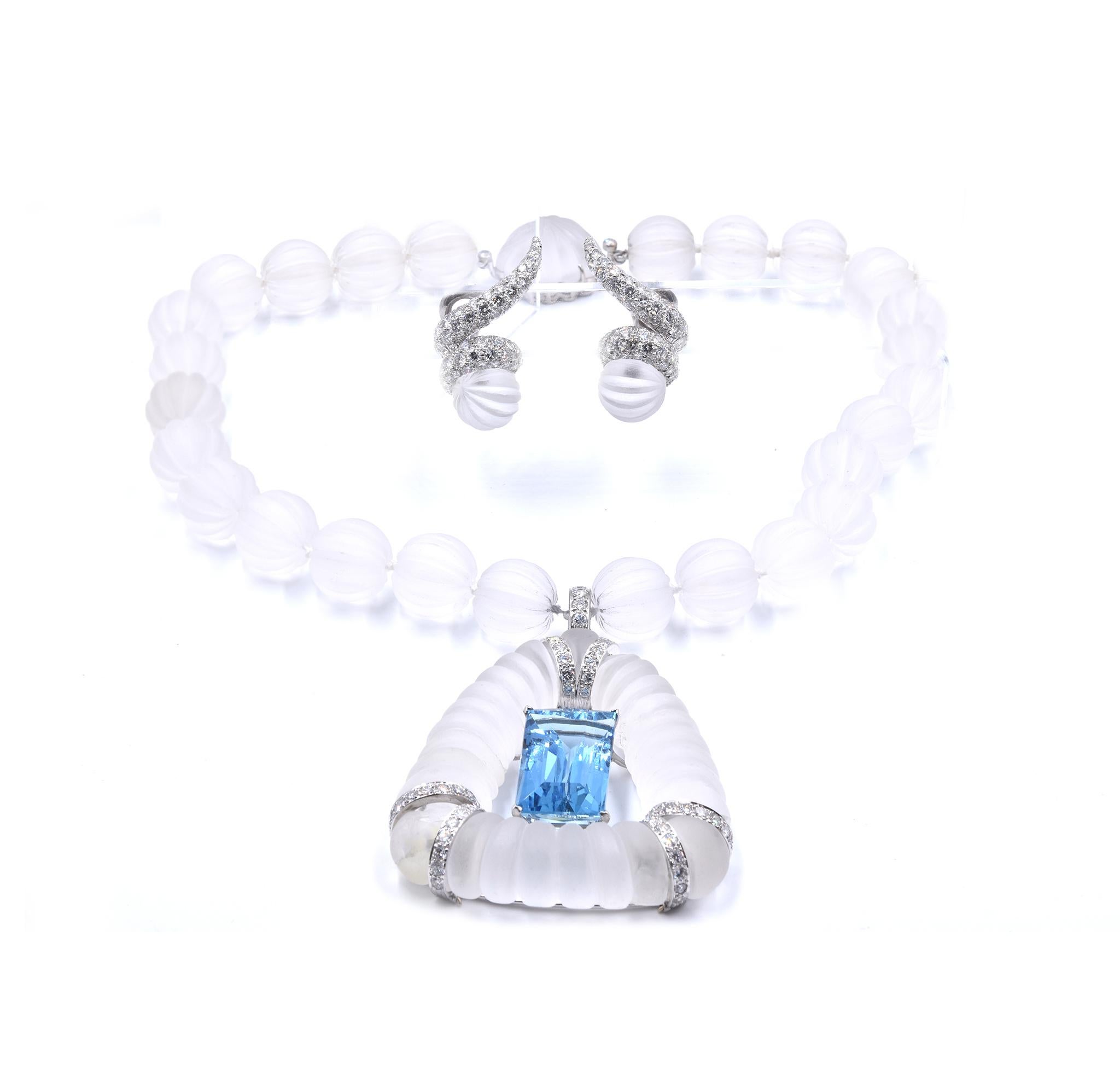 Material: 18K white gold / carved rock crystal
Diamond: 168 round brilliant cut = 4.00cttw
Color: G
Clarity: VS2
Aquamarine: 1 emerald cut = 25.00ct
Dimensions: necklace measures 16-inches
Weight: 206.36 grams

