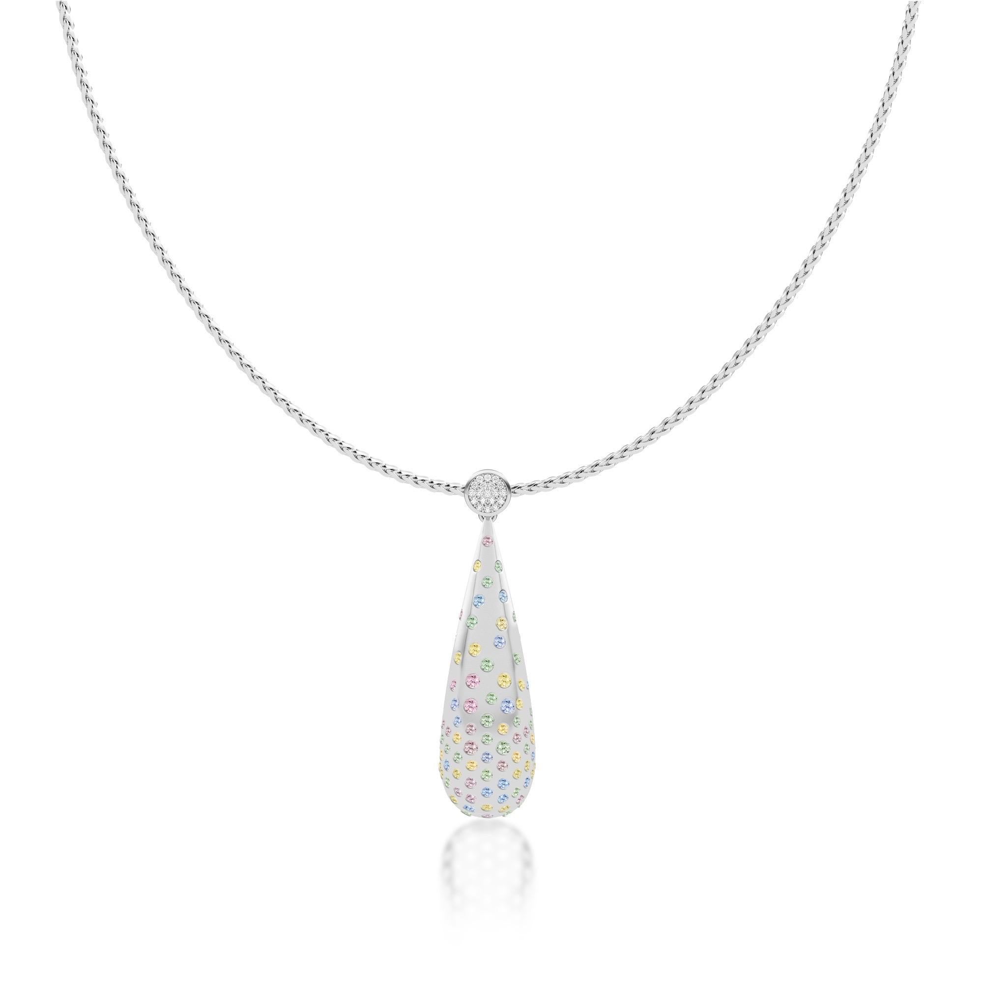 Ruben Manuel Designs “Spring” Pendant.
18K WG pear drop with pastel sapphires & VS white pave bail.