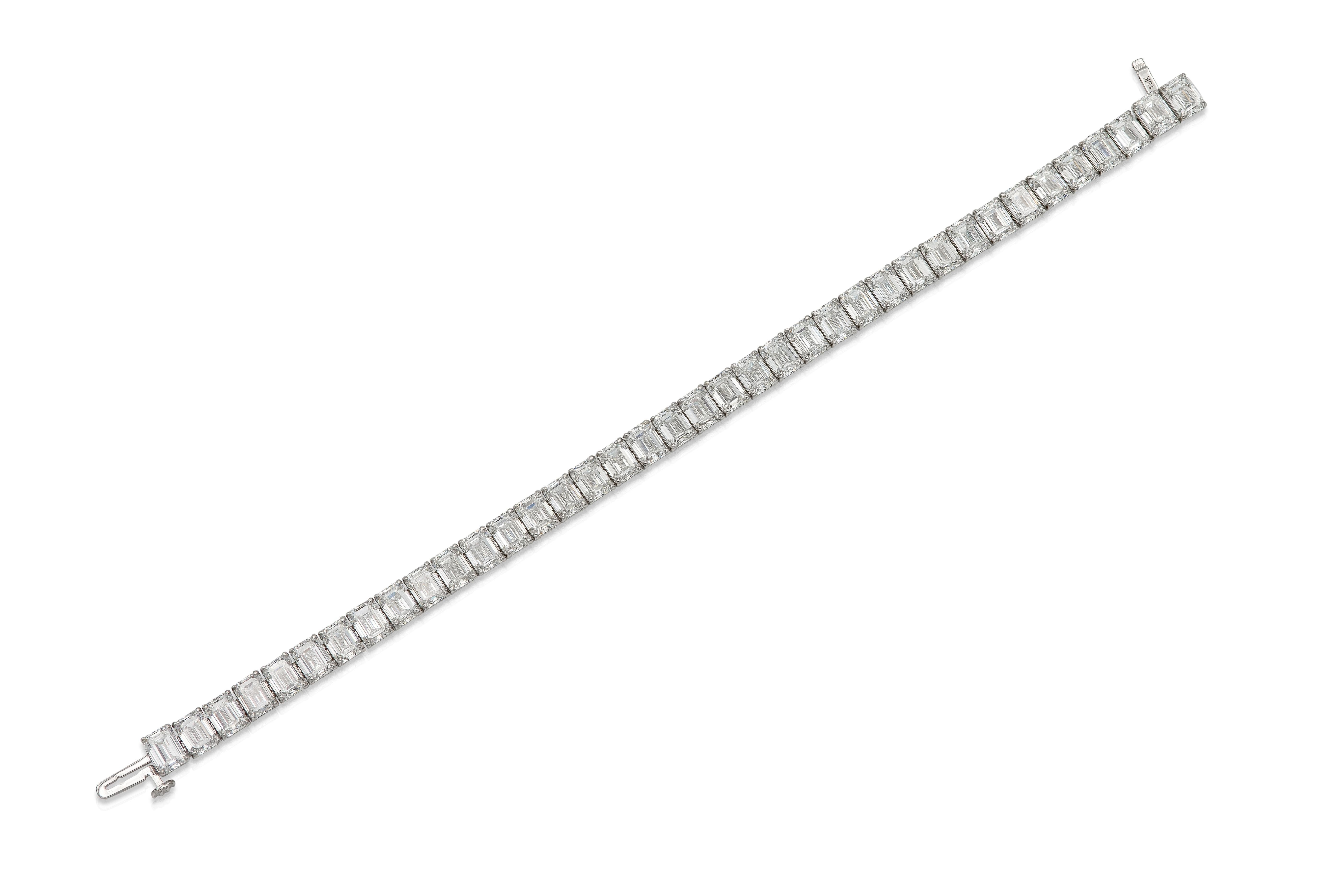 Handmade 18K White Gold Tennis Bracelet with 38 GIA certified Natural Emerald Cut Diamonds D-E-F color VVS1-VS2 clarity weighting 30.48 carat, 7 inch.