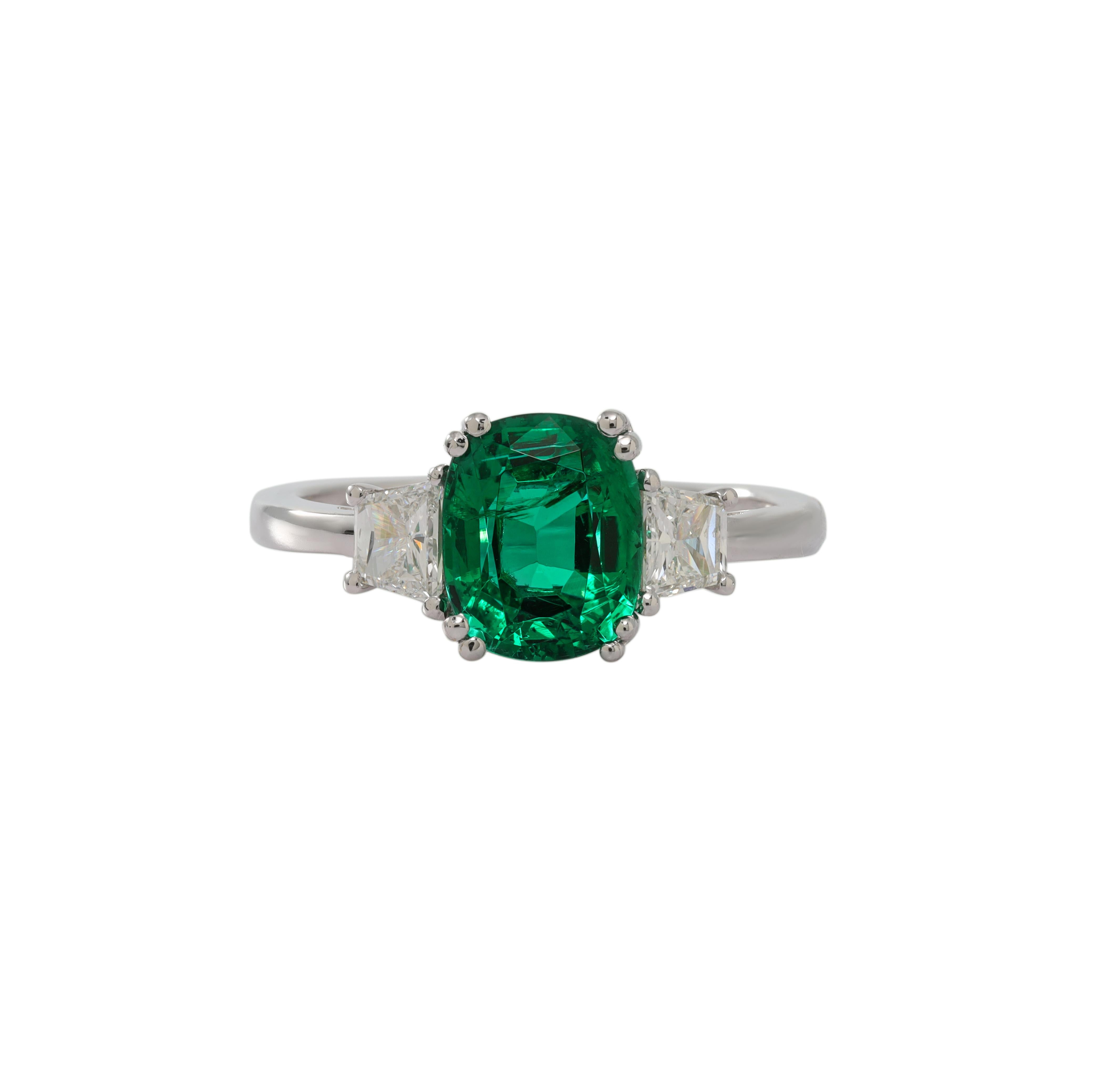 Oval Cut 18k Wg Emerald Ring with Tr. Diamond 0.57ct and Emerald 2.05ct For Sale