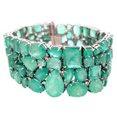 18K WG Link Bracelet with 1.5ct Round H SI Diamonds & 112ct Multi Shape Emerald