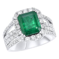 18k Wg Ring, Diamond 1.69ct, Emerald 3.01ct 8.78gm, 102st