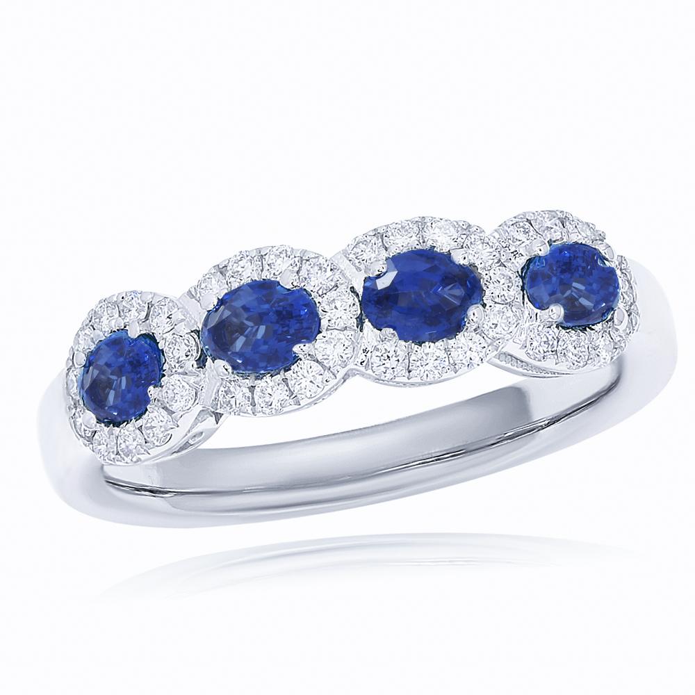 Oval Cut 18k Wg Ring with 0.84ct Sapphire and 0.32ct Diamond For Sale