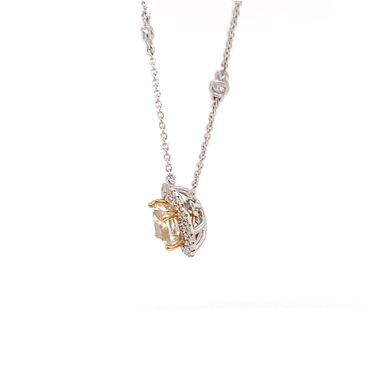 This stunning 18k White gold and 22k Yellow gold necklace feature a 1.50 Carat Yellow Square cushion-shaped diamond encircled by two rows of brilliant round diamonds on a 1 mm station chain containing fourteen (14) round brilliant diamonds bezel