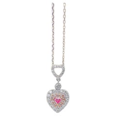 Collana con chiusura a cuore con diamanti in oro bianco e rosa 18 carati