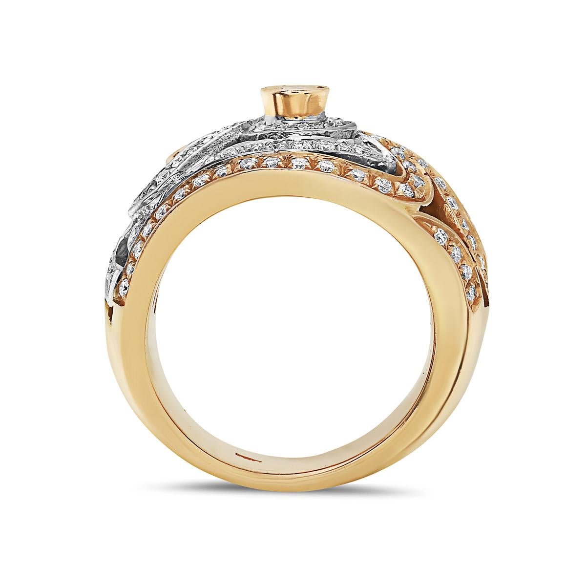 This statement cocktail ring features 0.88 carats of G VS round brilliant cut diamonds set in 18K white and rose gold. Size 7.25. 15.76g tw. Made in Italy. 