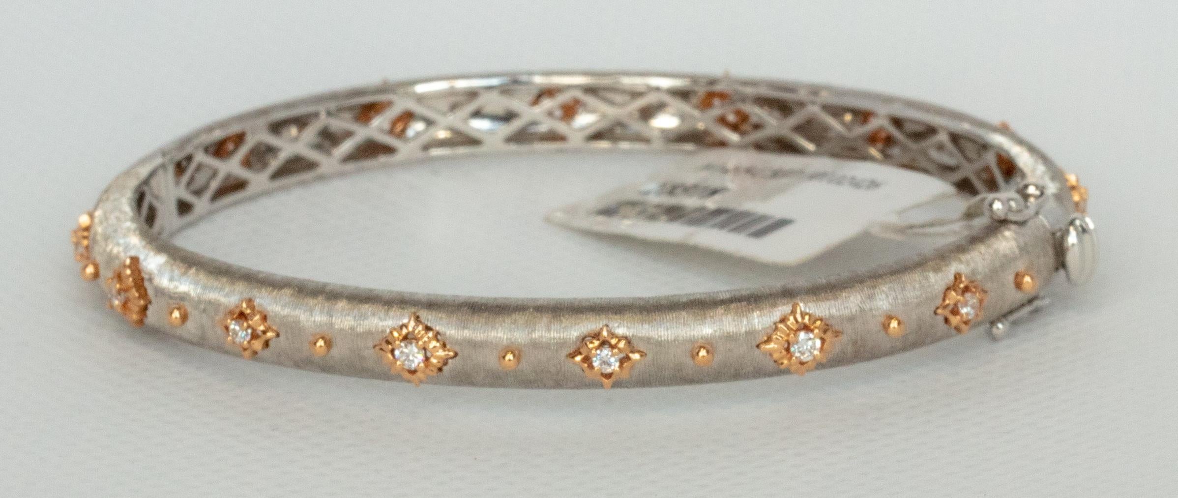 18K WHITE AND ROSE GOLD DIAMONDS BRACELET / Bangle
14 Round Diamonds - 0.28 cts
18KWR - 19.60 gm
Size - 48 x 58 cm / 2.28 x 1.89 inches

This unique piece is made using the Florentine exquisite technique of feather thin sophisticated hand