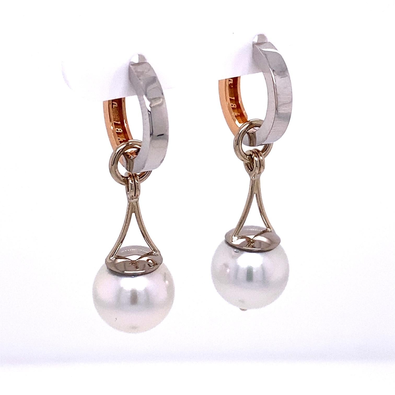 A pair of 18k Rose and white gold reversible huggie earrings, with a pair of 18k white gold jackets set with 10.9mm South Sea silver white pearls. These earrings were made and designed by llyn strong.
Items sold separately upon request.