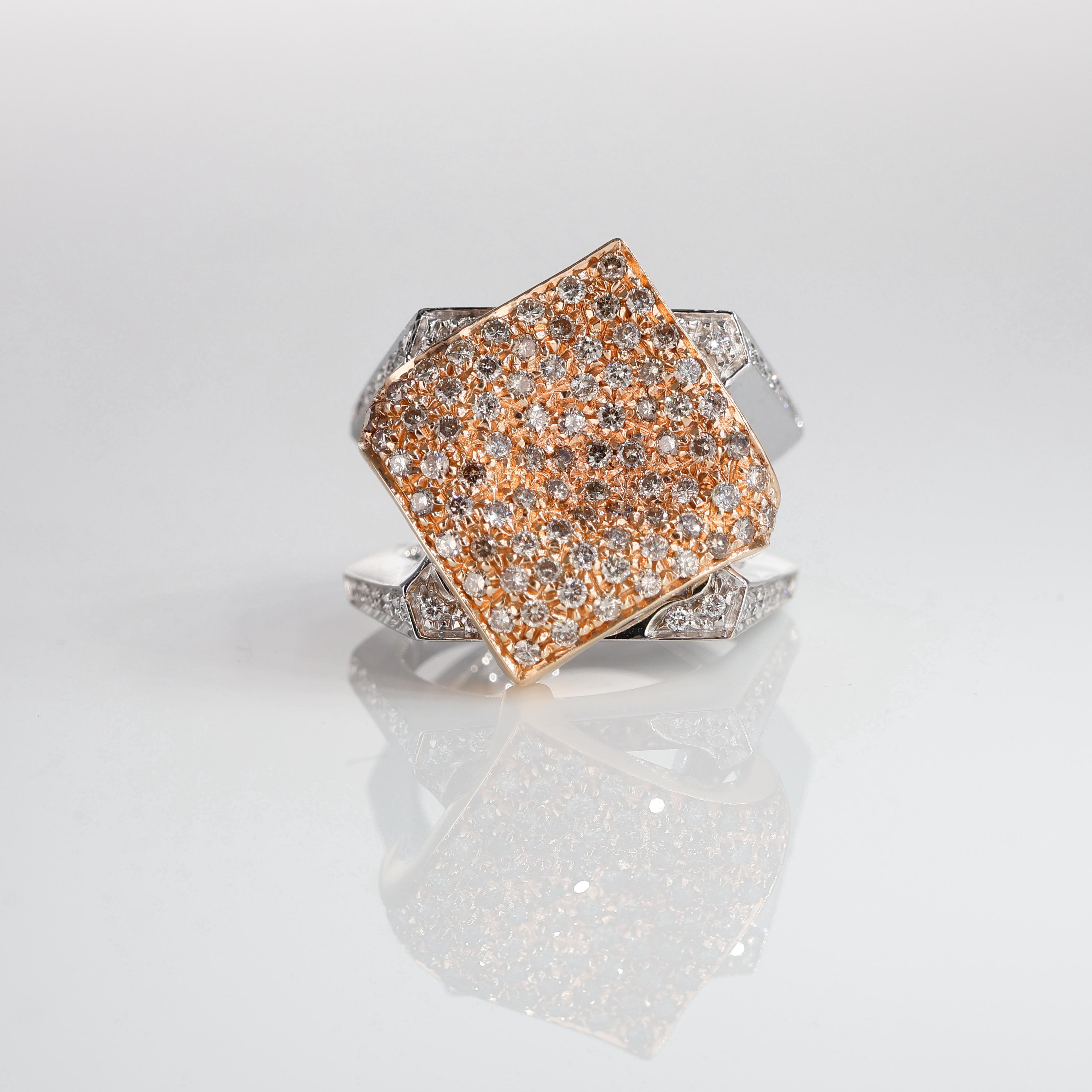 IMPORTANT NOTE:
✔ No additional costs will be added to this order.
✔ Shipping and customs duties are fully covered by us.
--------------------
This exquisite ring is crafted in 18K white and rose gold, featuring a unique central mobile rhombus