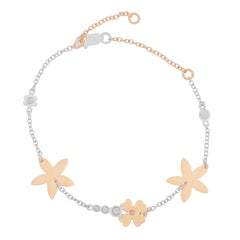 gold bracelet with white flowers 18k White and Rose Gold with Diamonds and Flowers Bracelet