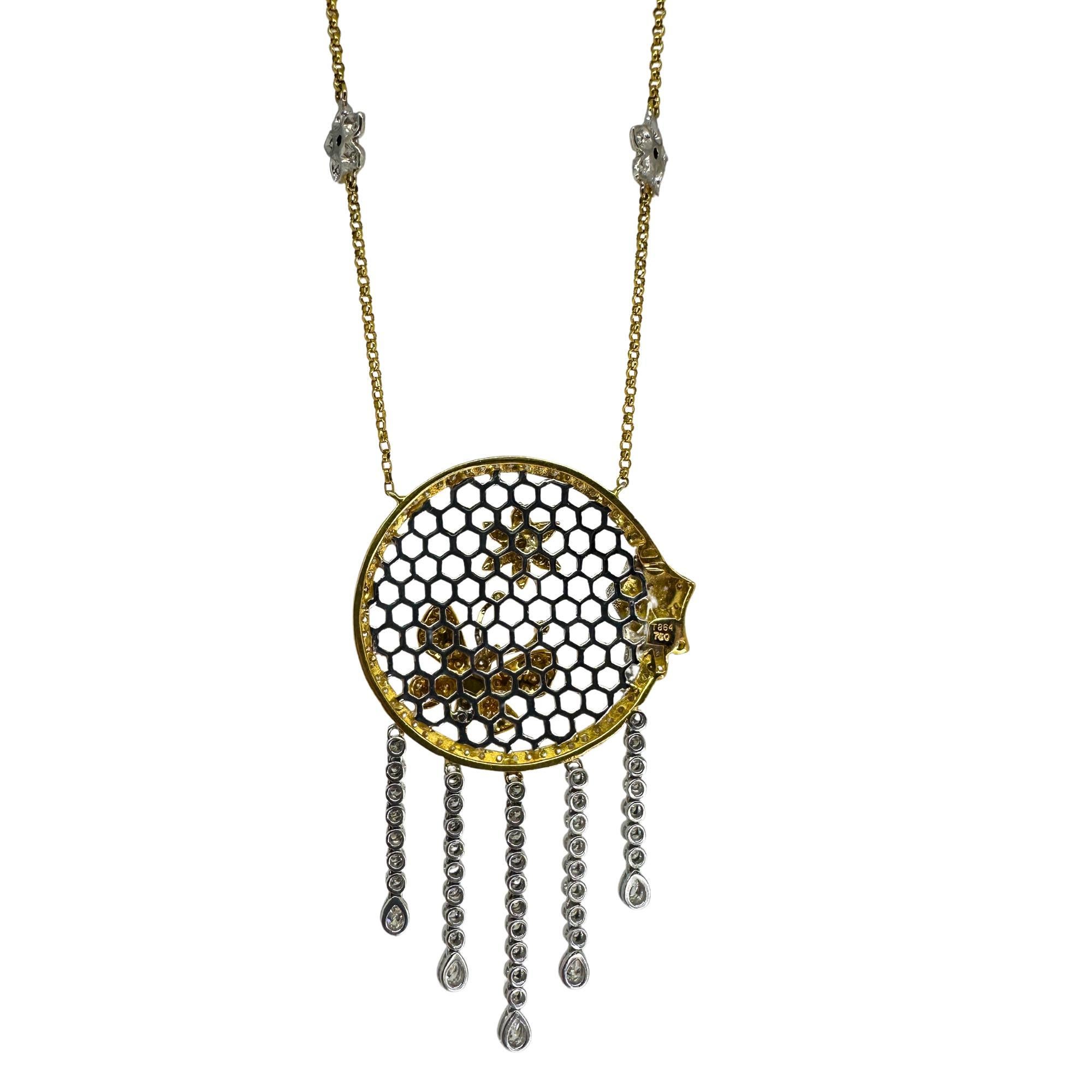 This gorgeous necklace features a stunning 18k white and yellow gold butterfly and flower pendant, adorned with 1.94 carats of sparkling diamonds. With a 15.5 inch chain and a weight of 17.6 grams, this unique piece is both elegant and eye-catching.