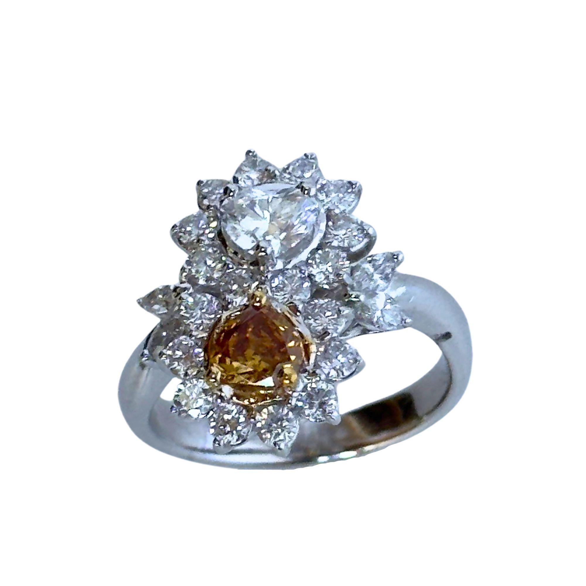 Look at this beautiful 18k White and Yellow Diamond Ring. This ring weighs a delightful 5.84 grams and a size 6.25 ring. The white diamonds weigh 1.30 carats while the yellow diamond weighs 0.38 carats, creating a delightful contrast and adding a