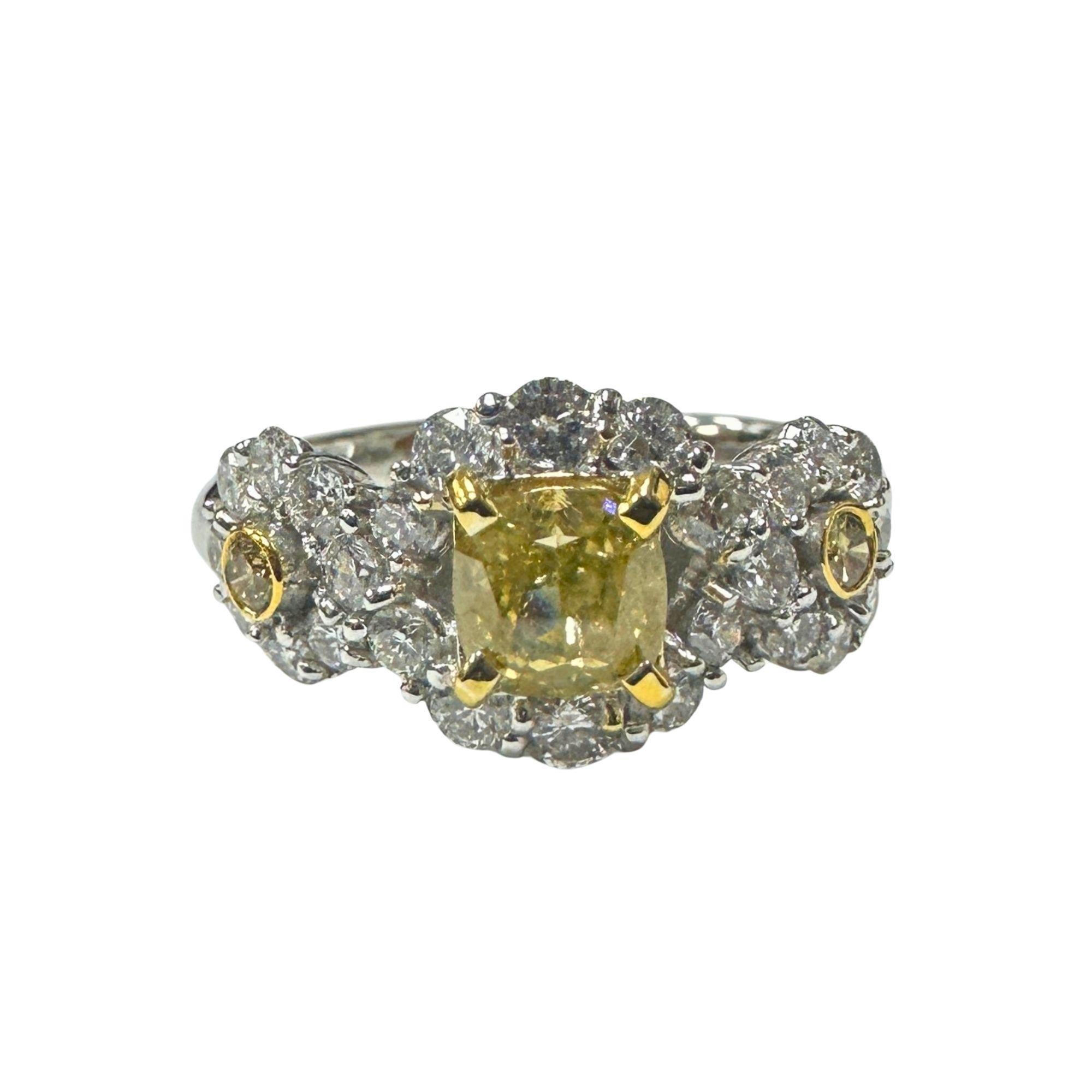 Look at this beautiful 18k White and Yellow Diamond Ring weighs 5.1 grams and size 6.25. The beautiful yellow diamonds are surrounded by white diamond weighing 1.48 carats. A stunning fusion of simplicity and beauty. 

18k White and Yellow Diamond