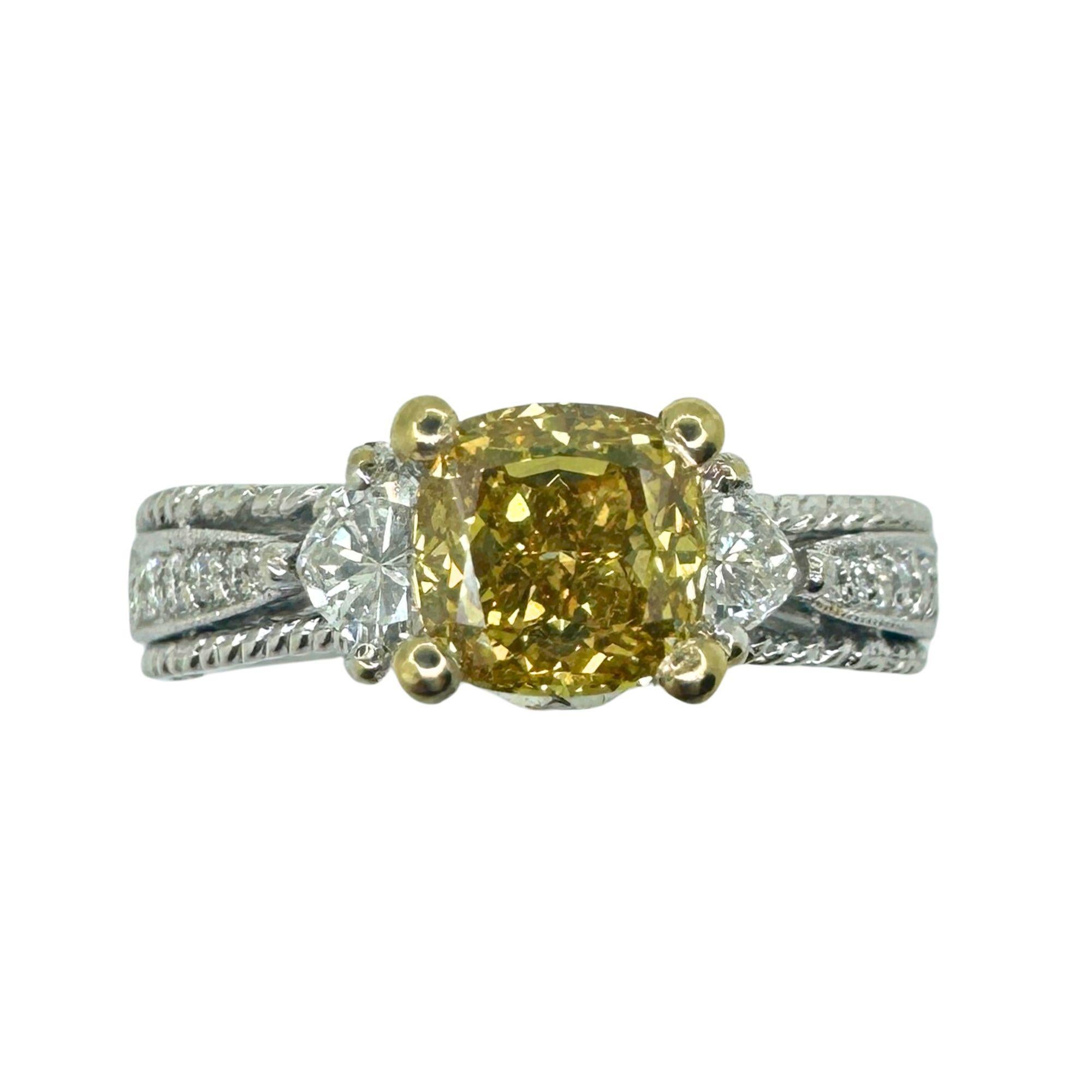 This 18k White and Yellow Diamond Ring is a stunning choice. Crafted from 18k white gold and featuring a total of 1.54 carats of sparkling diamonds, this ring is sure to catch the eye. With a ring size of 6.75 and a weight of 5.56 grams, it's the