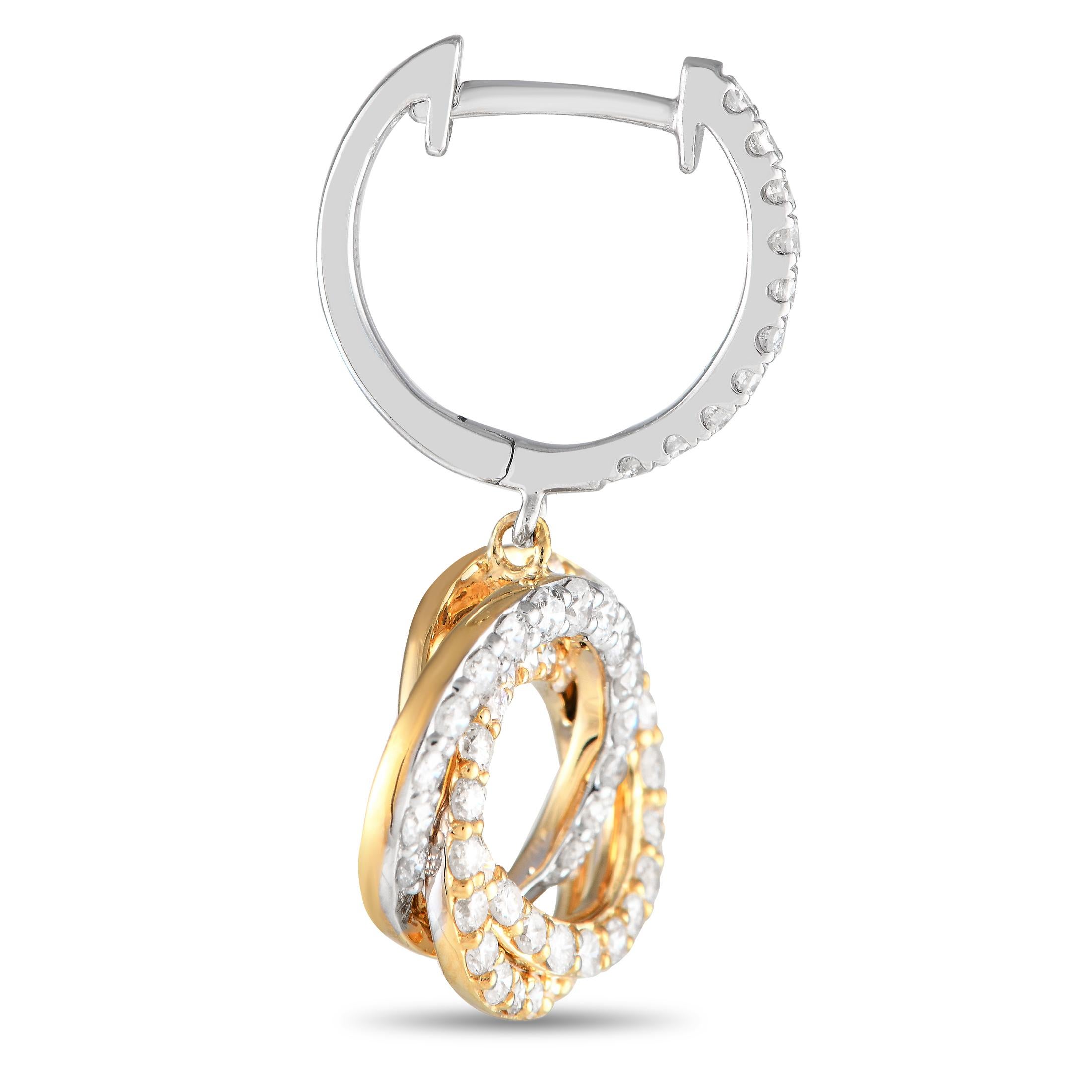 A stunning combination of 18K white gold and 18K yellow gold add depth and dimension to these luxury earrings. Each one features a circular setting that measures 1.0 long by 0.50 wide. Diamonds with a total weight of 1.0 carats allow them to sparkle