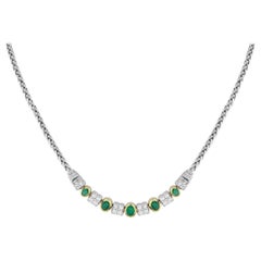 Collana in oro bianco e giallo 18 carati con diamanti e smeraldi da 1,65 carati