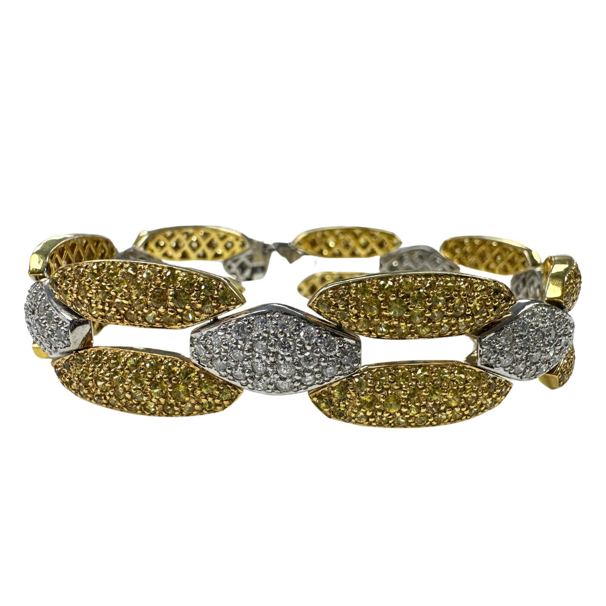 18K White and Yellow Gold Diamond and Yellow Sapphire Bracelet
Condition: In good condition with some minor surface wear consistent with age.
Length: 7.5 inches
Marking: 