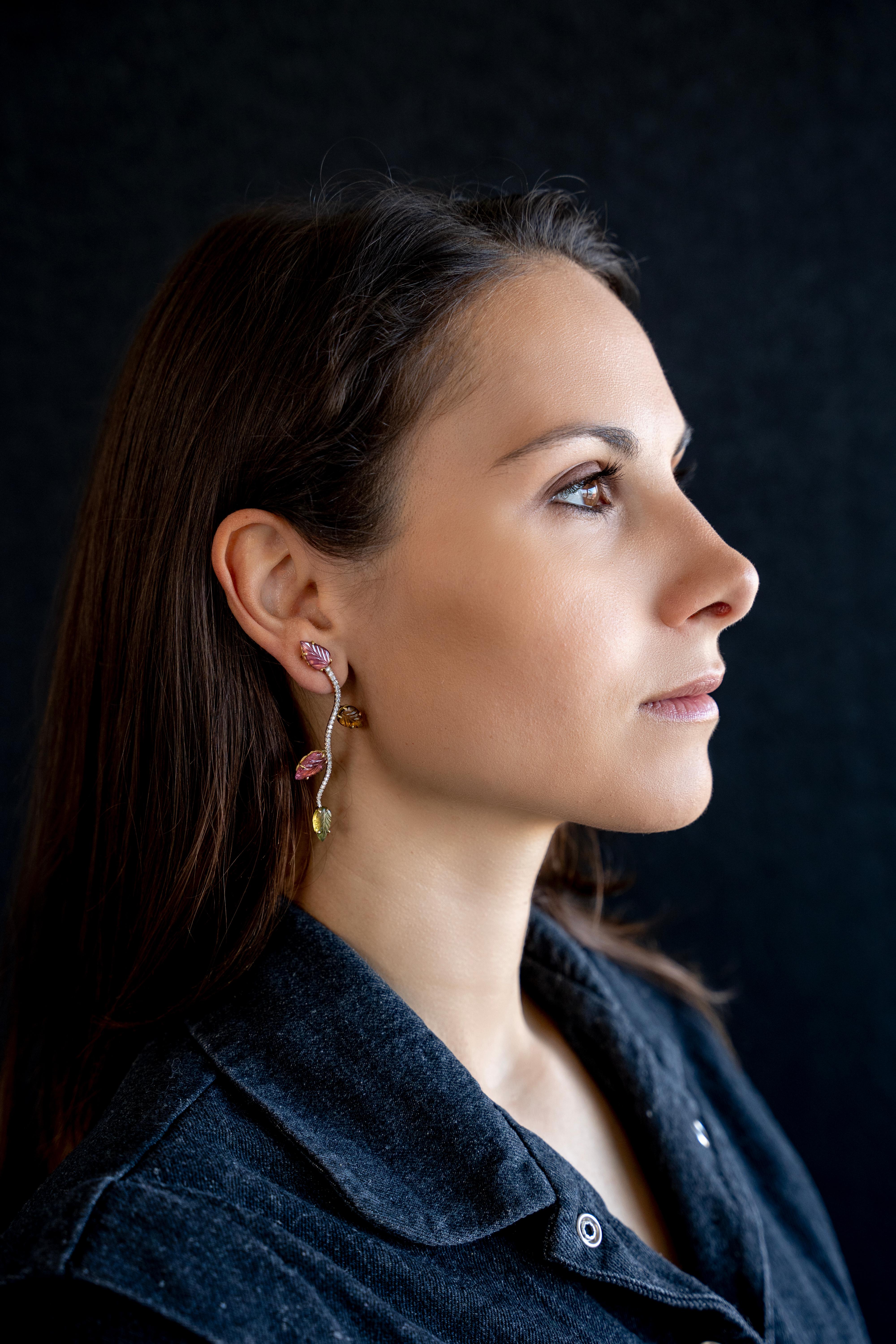 These unique earrings have been created from an original vine stalk drawing based design. 
Eight engraved tourmalines weight : 8,03 carats.
White diamonds weight : 0.60 carat. 
18K white and yellow gold.
French assay mark.
Price without local taxes.