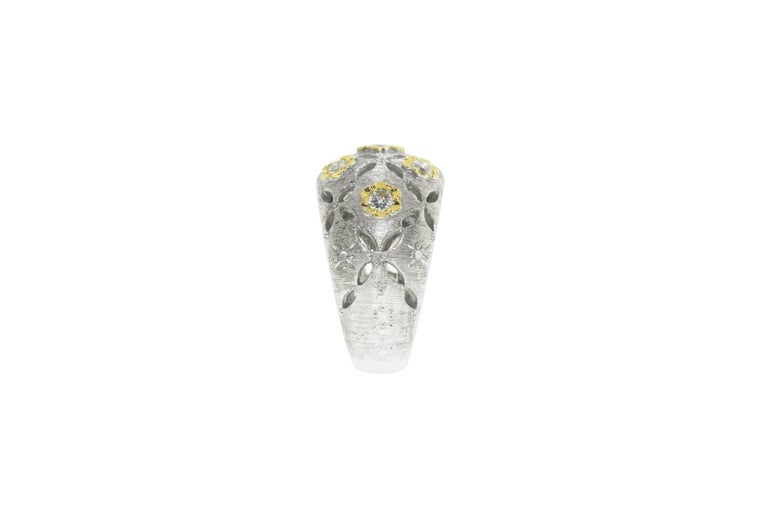Modern 18 Karat White and Yellow Gold Eyelet Flower Band Diamond Ring For Sale