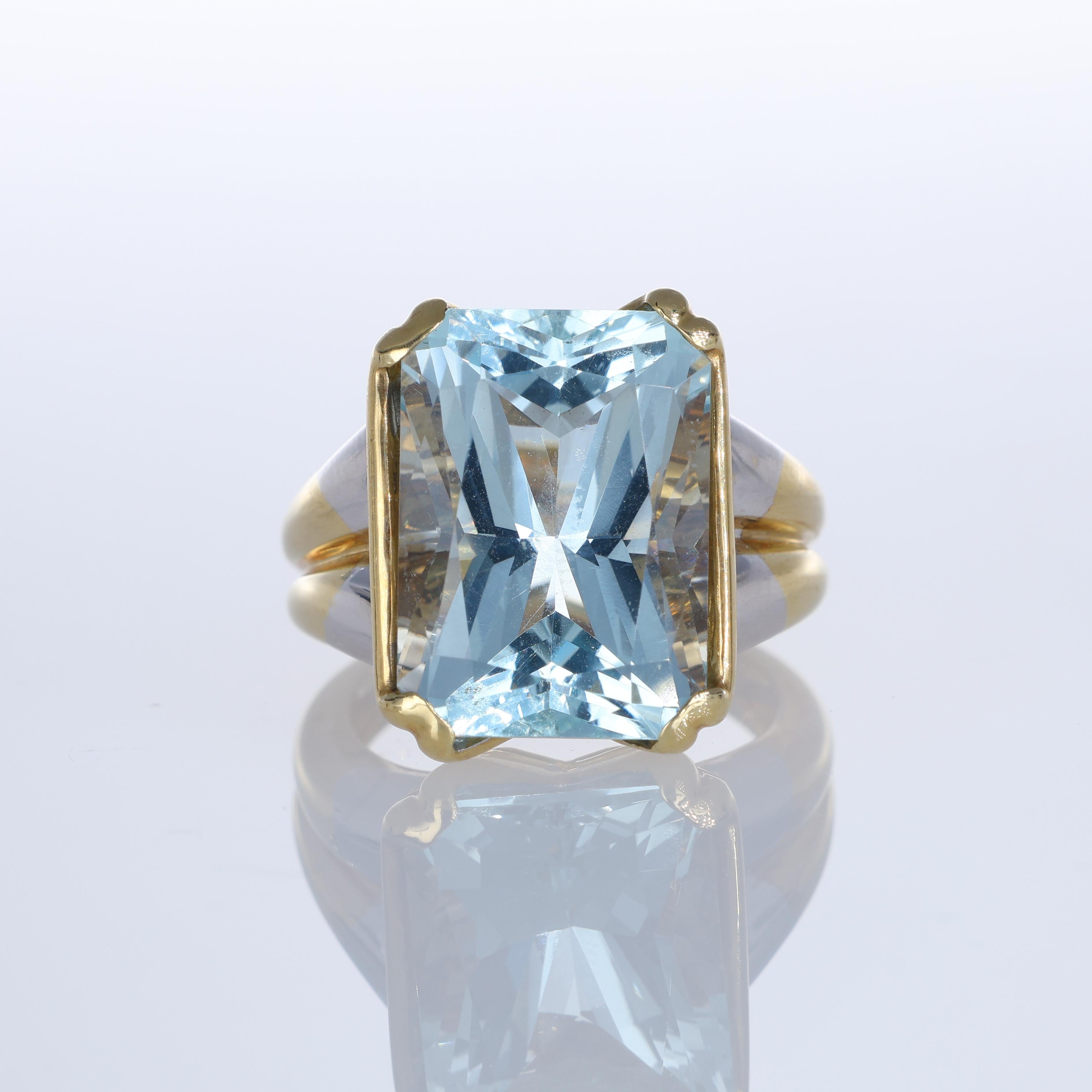 IMPORTANT NOTE:
✔ No additional costs will be added to this order.
✔ Shipping and customs duties are fully covered by us.
--------------------
A striking 18K white and yellow gold ring featuring a magnificent 13.38-carat emerald-cut aquamarine. The