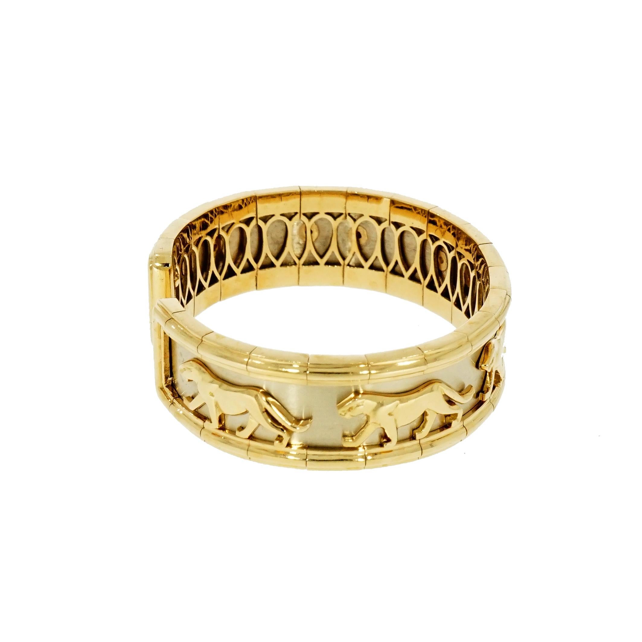 One of the most stylish designs, this classic Panther bracelet. 
Crafted without compromising on quality, a solid 18k White and Yellow Gold.
Specifically designed for those who want to feel different.
Measures 6.5 inches in diameter and weighs 83