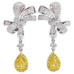 Pendientes Lazo Lágrima Oro Blanco y Amarillo 18K con Diamantes Amarillos y Blancos