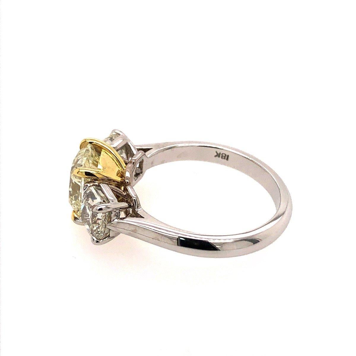 Modern 18 Karat White and Yellow Gold Yellow Diamond Three-Stone Ring 4.20 Carat
