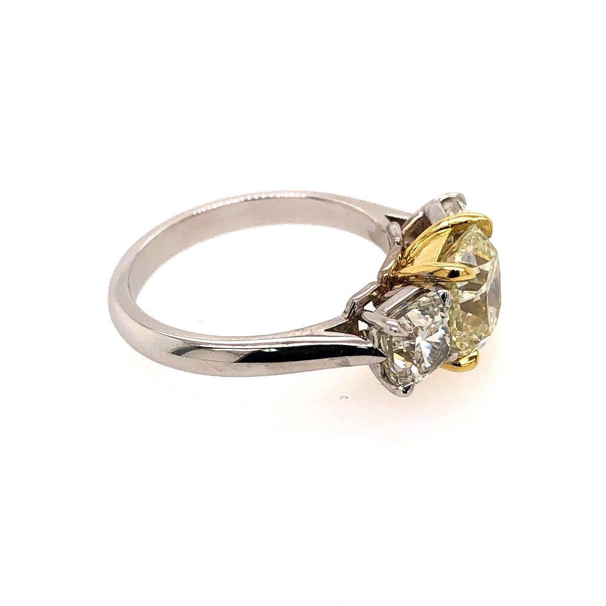 Cushion Cut 18 Karat White and Yellow Gold Yellow Diamond Three-Stone Ring 4.20 Carat