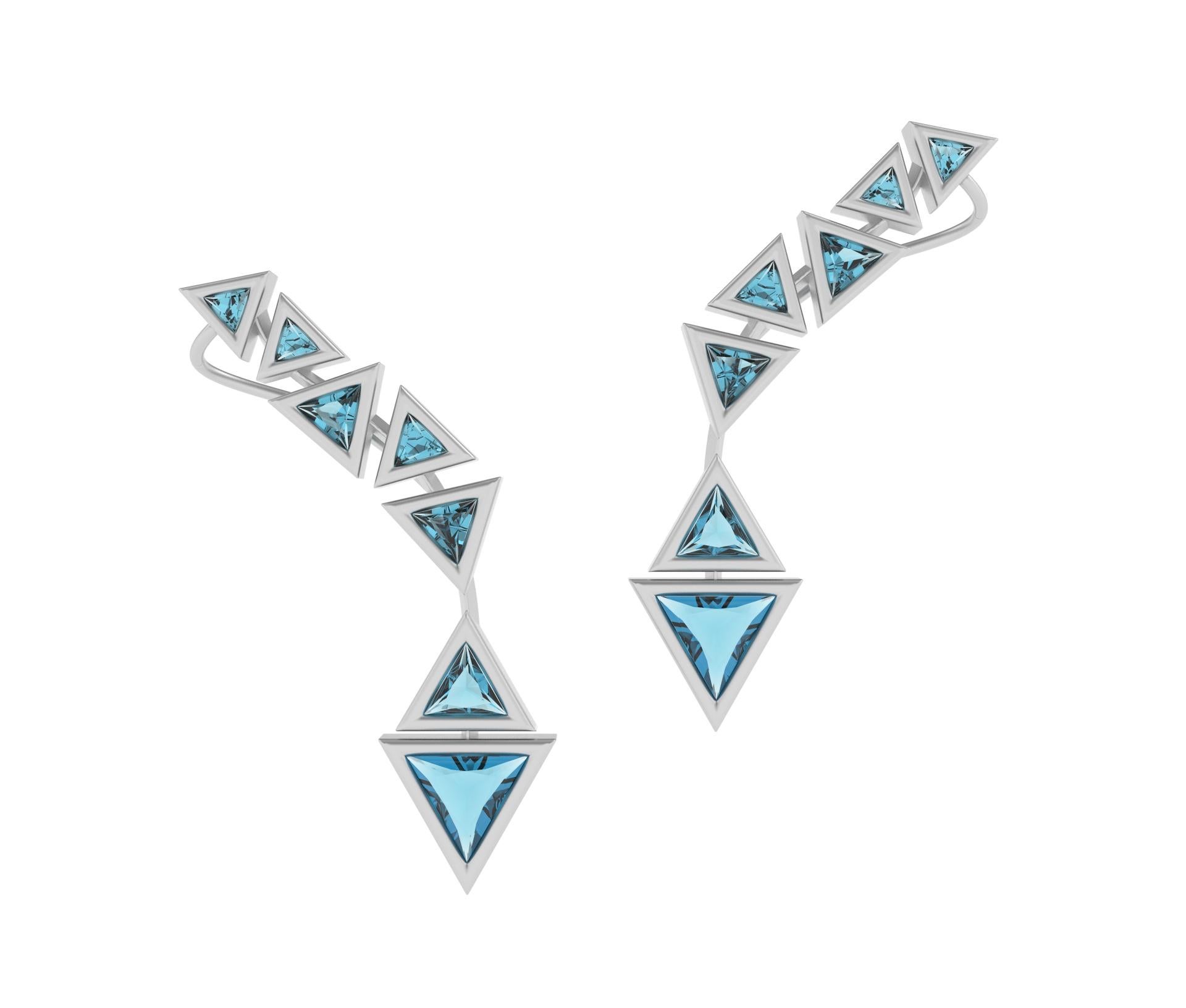 Contemporary 18k White Brushed Gold Cuff Earrings with Trillion Cut Blue Topaz