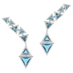 18k White Brushed Gold Cuff Earrings with Trillion Cut Blue Topaz