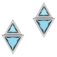 18k White Brushed Gold Stud Earrings with 5.27 Carats Trillion Cut Blue Topaz