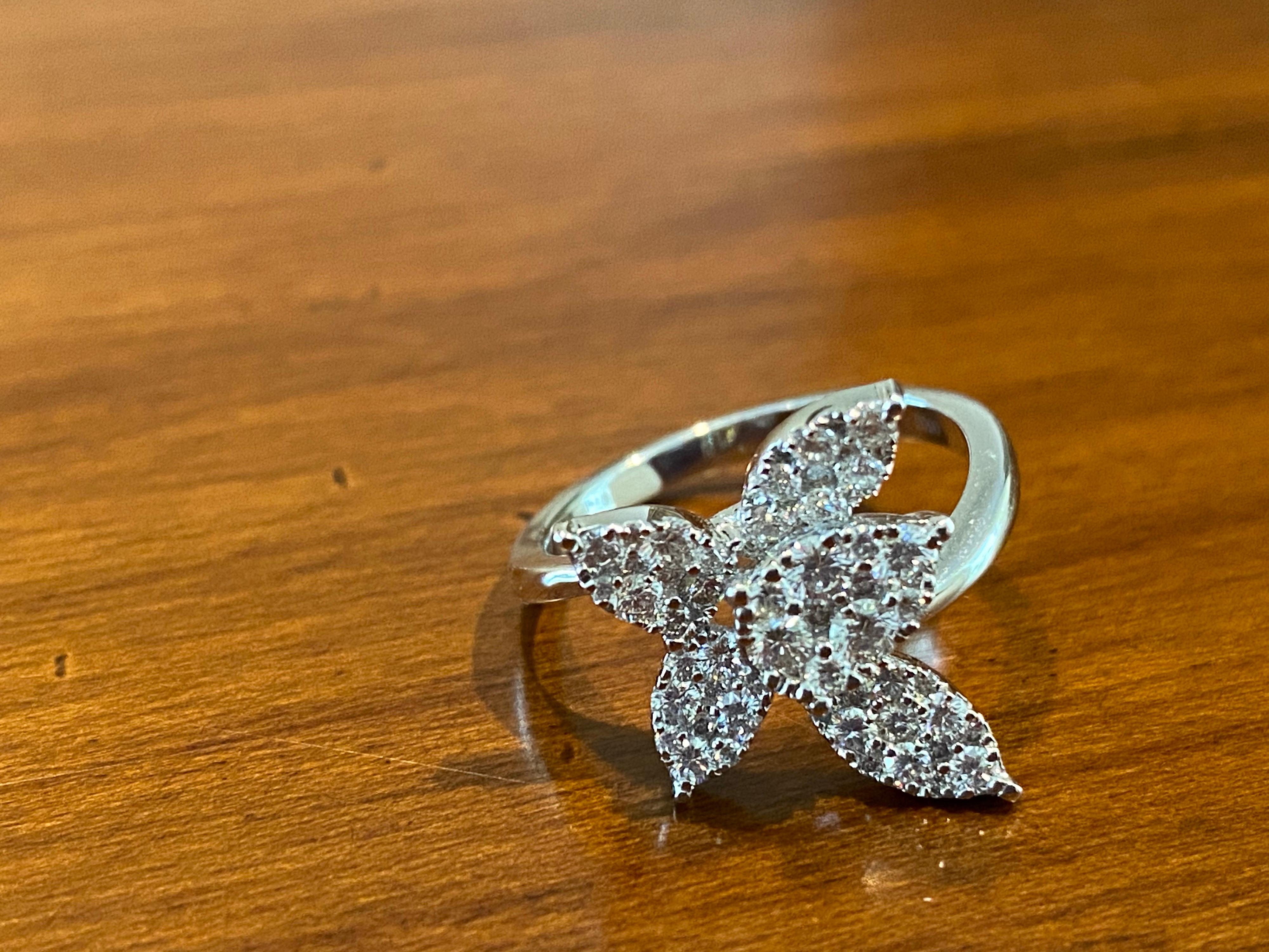 Women's 18 Karat White Diamond Flower Ring For Sale