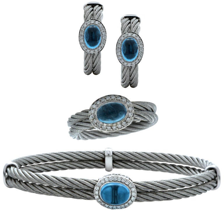 18 Karat White Gold and Stainless Steel Bangle, Ring and Earrings Suite For Sale at 1stDibs