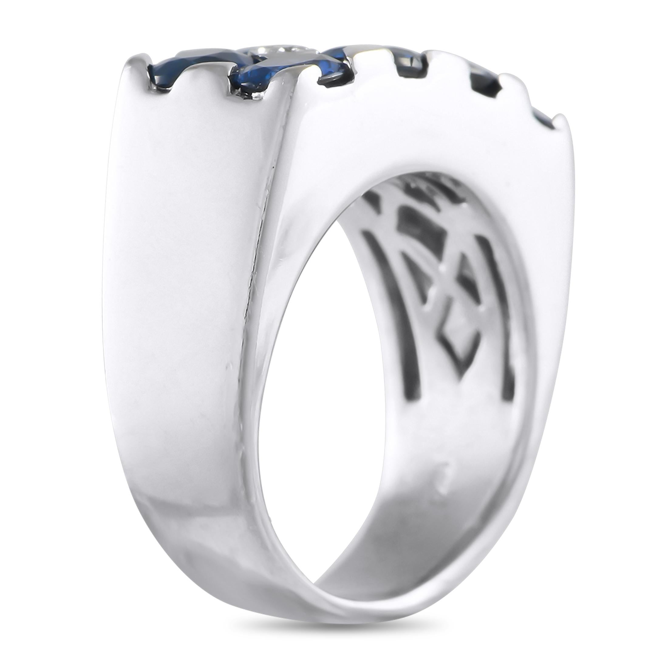 With three natural diamonds, eight oval sapphires, and a white gold flat-top band, this ring makes a stunning symbol to mark a meaningful occasion. Unlike the standard rounded and domed band, this sleek piece has a flat and angular top. The flat