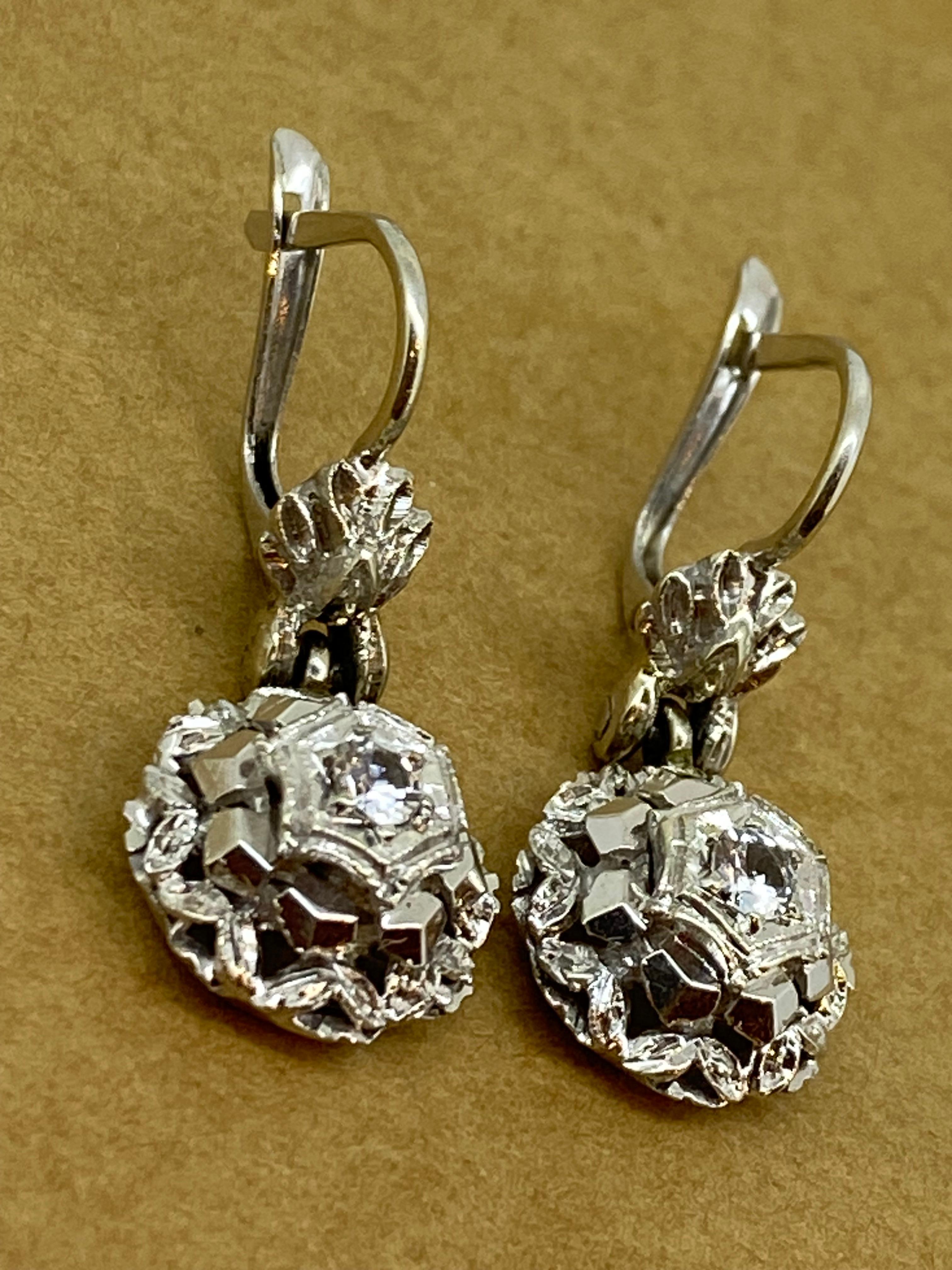 Of stunning floral & foliate motif,
these 18K White Gold & Diamond Earrings 
can become an ideal present for your loved one, 
as its striking design speaks for itself...

Each features a round brilliant cut diamond 
of excellent colour & clarity
of