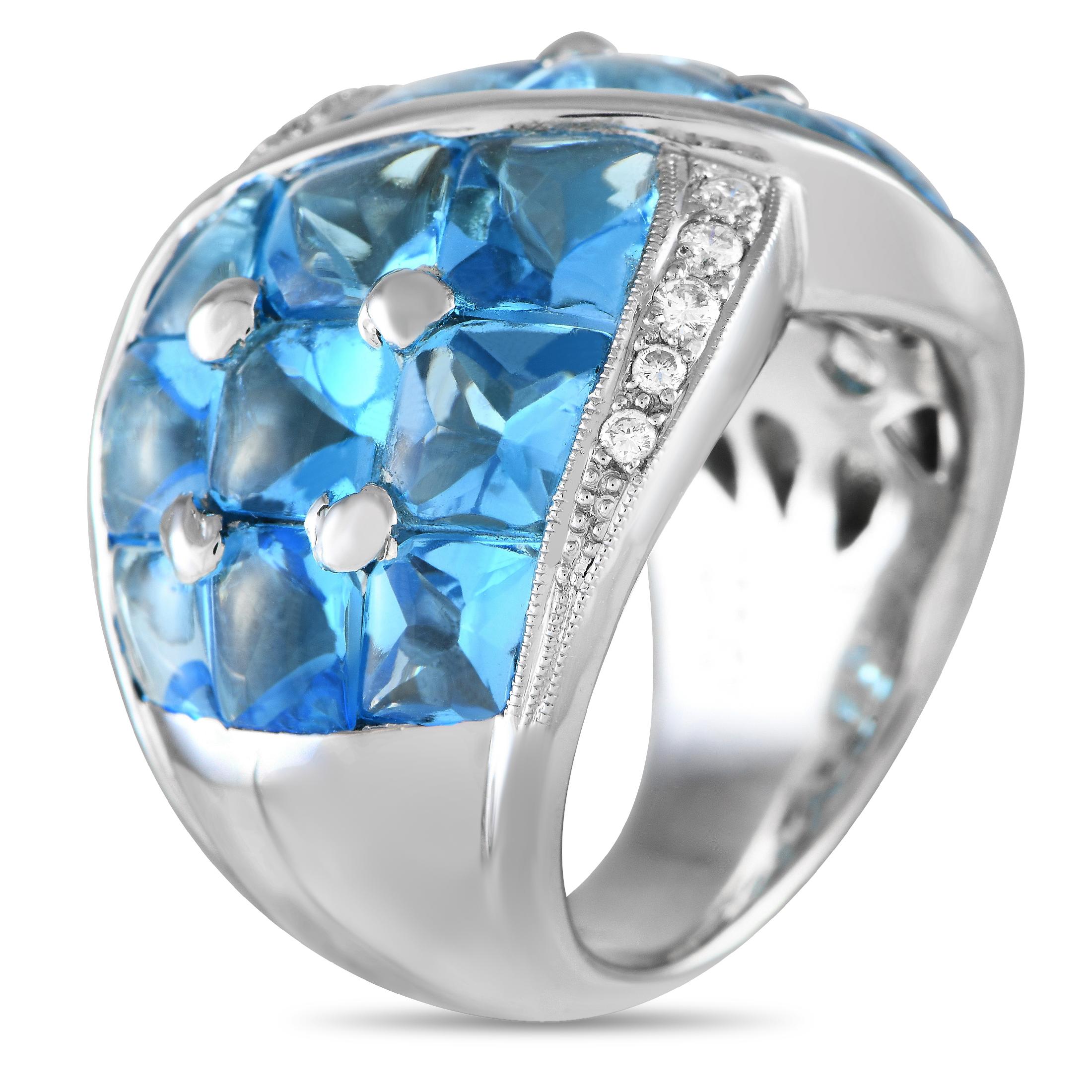 An array of brilliant blue Topaz gemstones totaling 10.68 carats allow this ring to effortlessly add a pop of color to any ensemble. This piece's 18K White Gold setting is also elevated by sparkling inset Diamonds with a total weight of 0.18 carats.