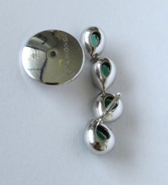 18 Karat White Gold 0.46 Carat White Diamonds 1.68 Emeralds Crawler Earrings