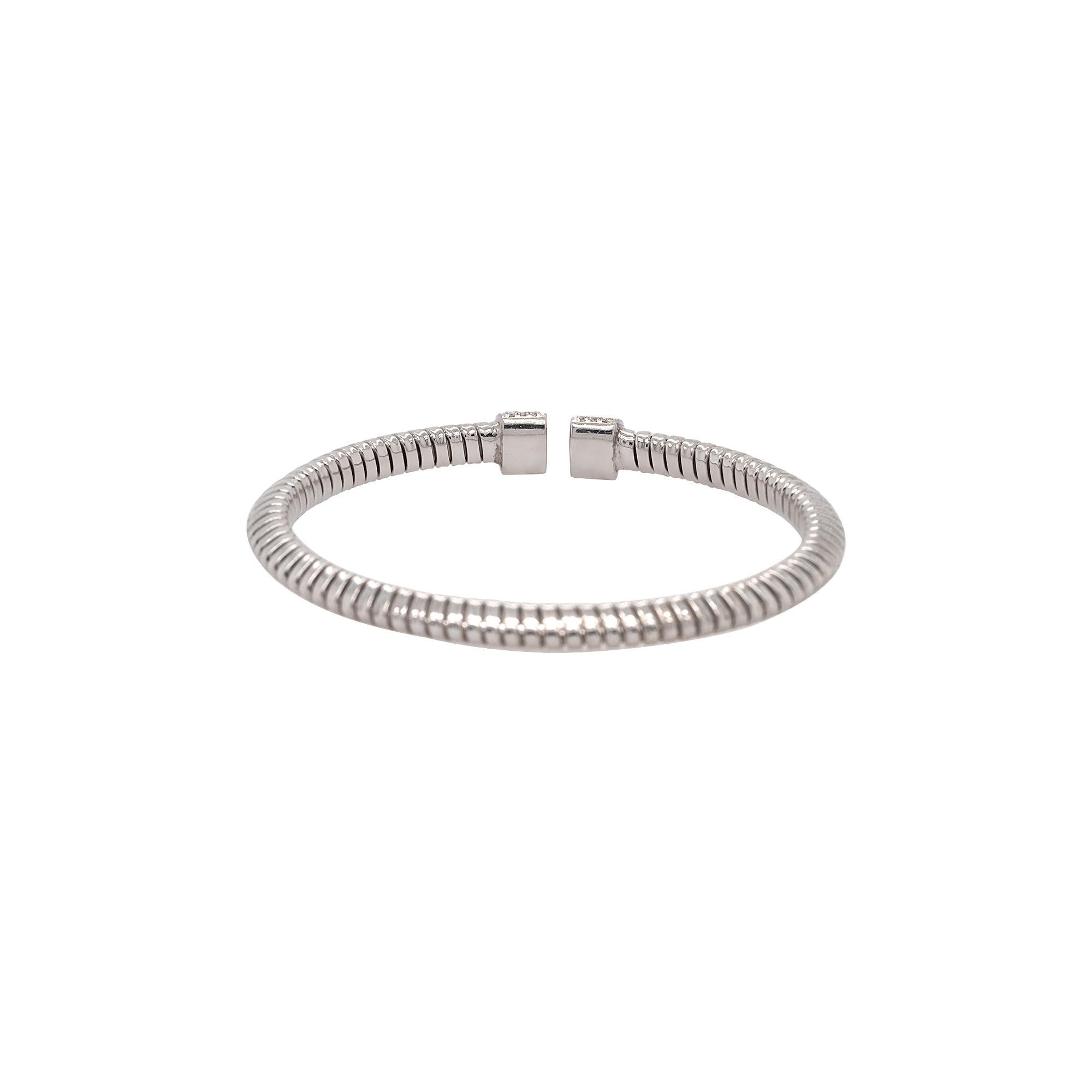 Immerse yourself in the timeless elegance of this exquisite 18k White Gold piece, beautifully adorned with 0.48 carats of natural round brilliant diamonds. The diamonds, featuring G/H color and VS clarity, emit a radiant sparkle that enhances the