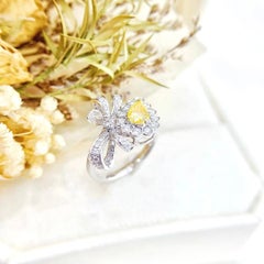 18K White Gold 0.52 CT Yellow Diamond Bow Ring with Diamonds