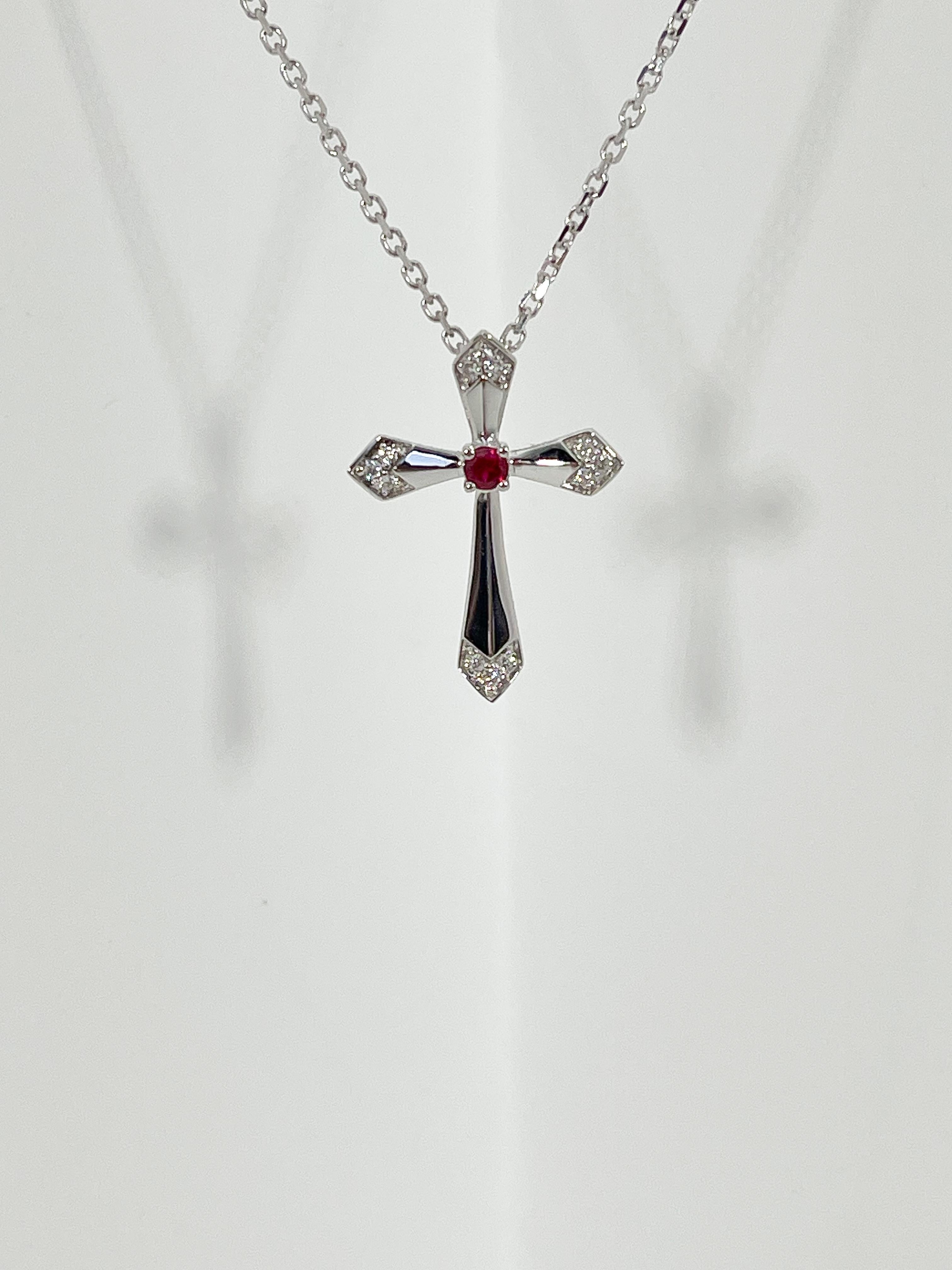 Round Cut 18K White Gold .06 CTW Diamond and .07 CT Ruby Cross Necklace For Sale