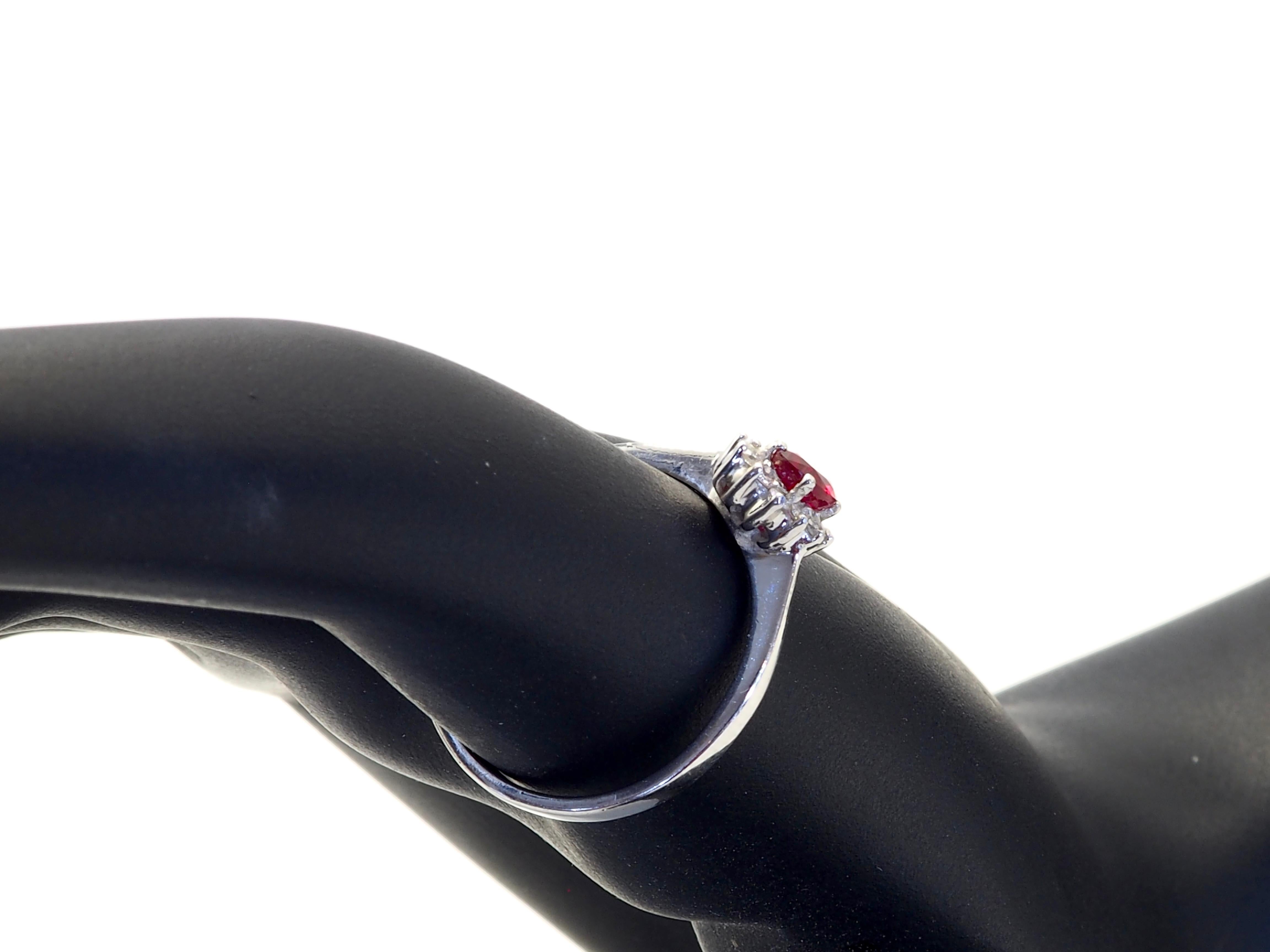 18K White Gold 0.62ct Oval Deep Red Ruby & 0.20ct Diamond Halo Ring For Sale 2