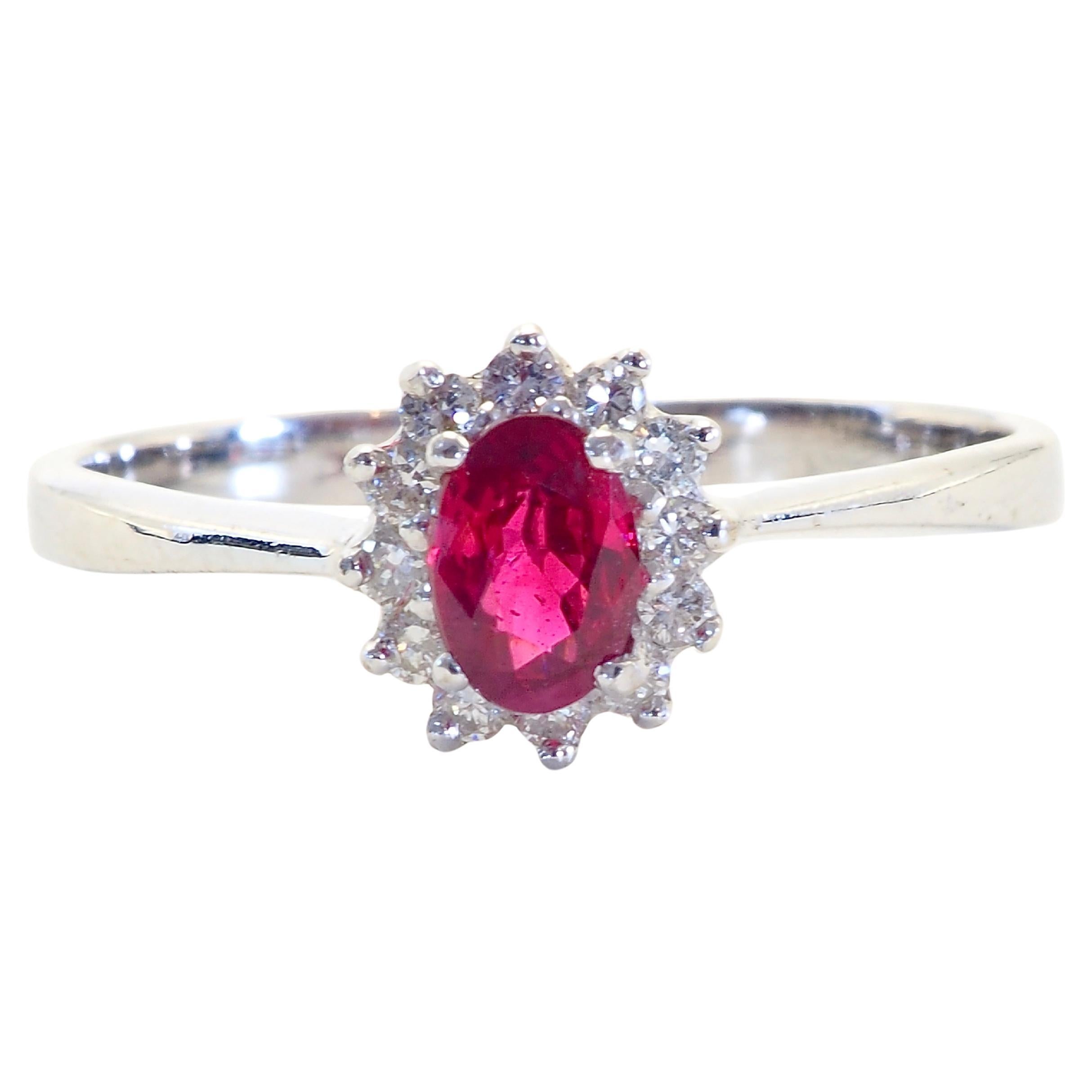18K White Gold 0.62ct Oval Deep Red Ruby & 0.20ct Diamond Halo Ring For Sale