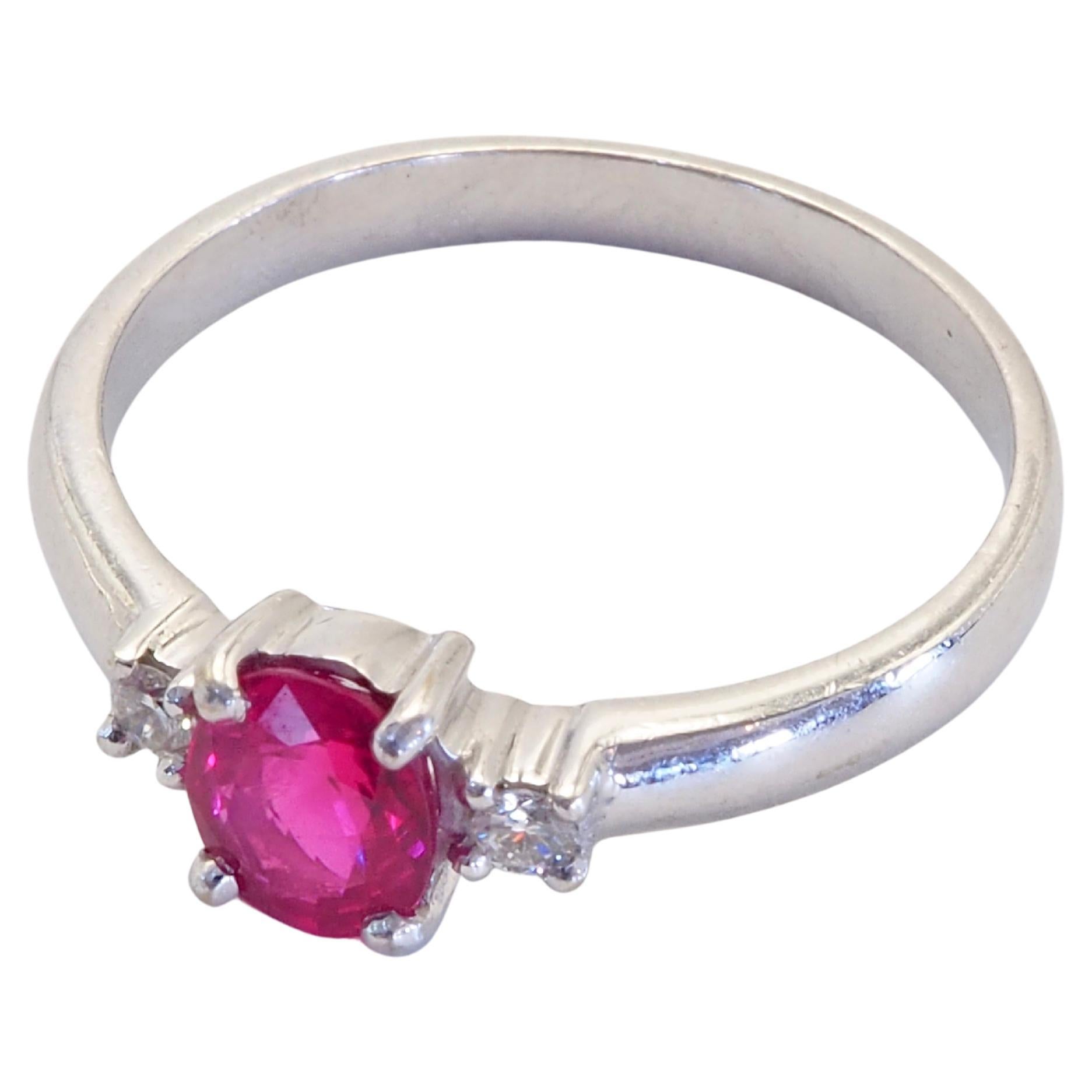 Women's 18K White Gold 0.69ct Oval Clear Ruby & 0.11ct Brilliant Diamond Ring For Sale