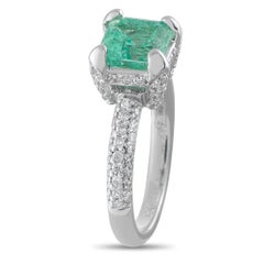 Ring aus 18 Karat Weißgold mit einem Diamanten von 0,70 Karat und einem Smaragd, Art.-Nr. MF25-062526