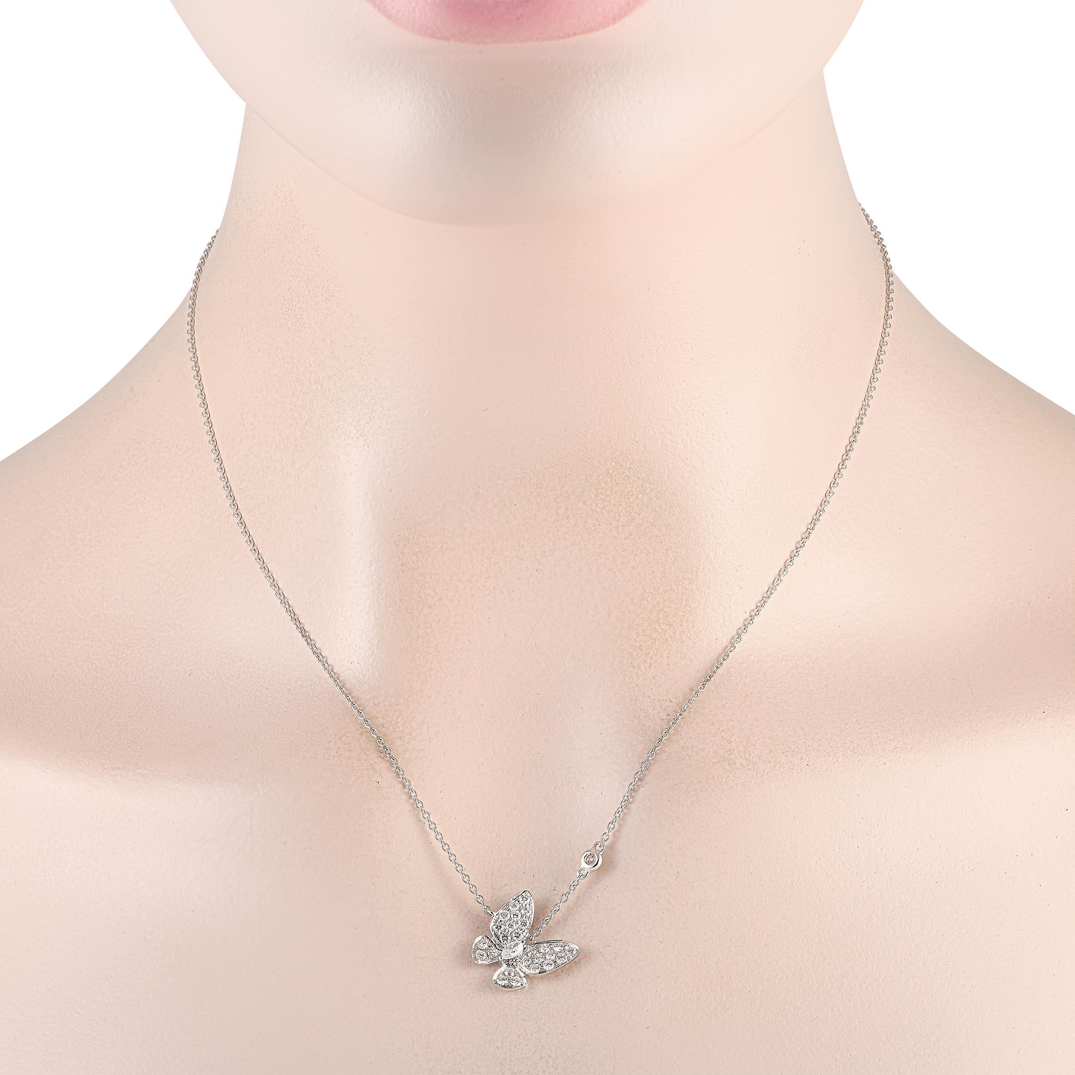 This exquisite necklace possesses a surprising sense of movement. At the center of a delicate 18 chain, an 18K white gold butterfly pendant measuring 0.75 round is perfectly paired with a single bezel-set diamond. This piece comes complete with a