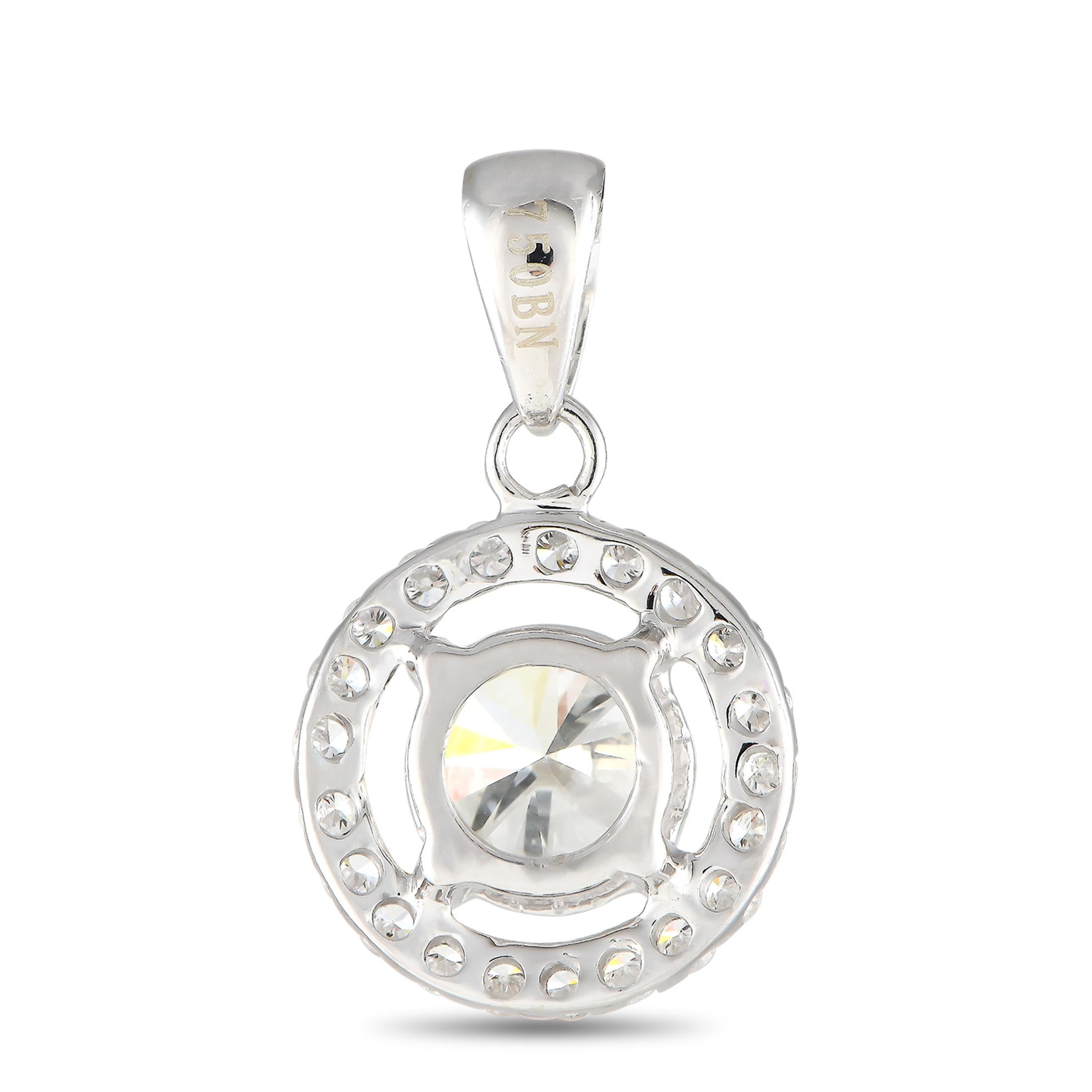 A classic piece to round out your jewelry wardrobe. This 18K white gold pendant features a 0.55-carat round diamond centerstone, surrounded by a circular frame of petite diamonds totaling 0.18 carats. The pendant measures 0.65 x 0.45 and is held by