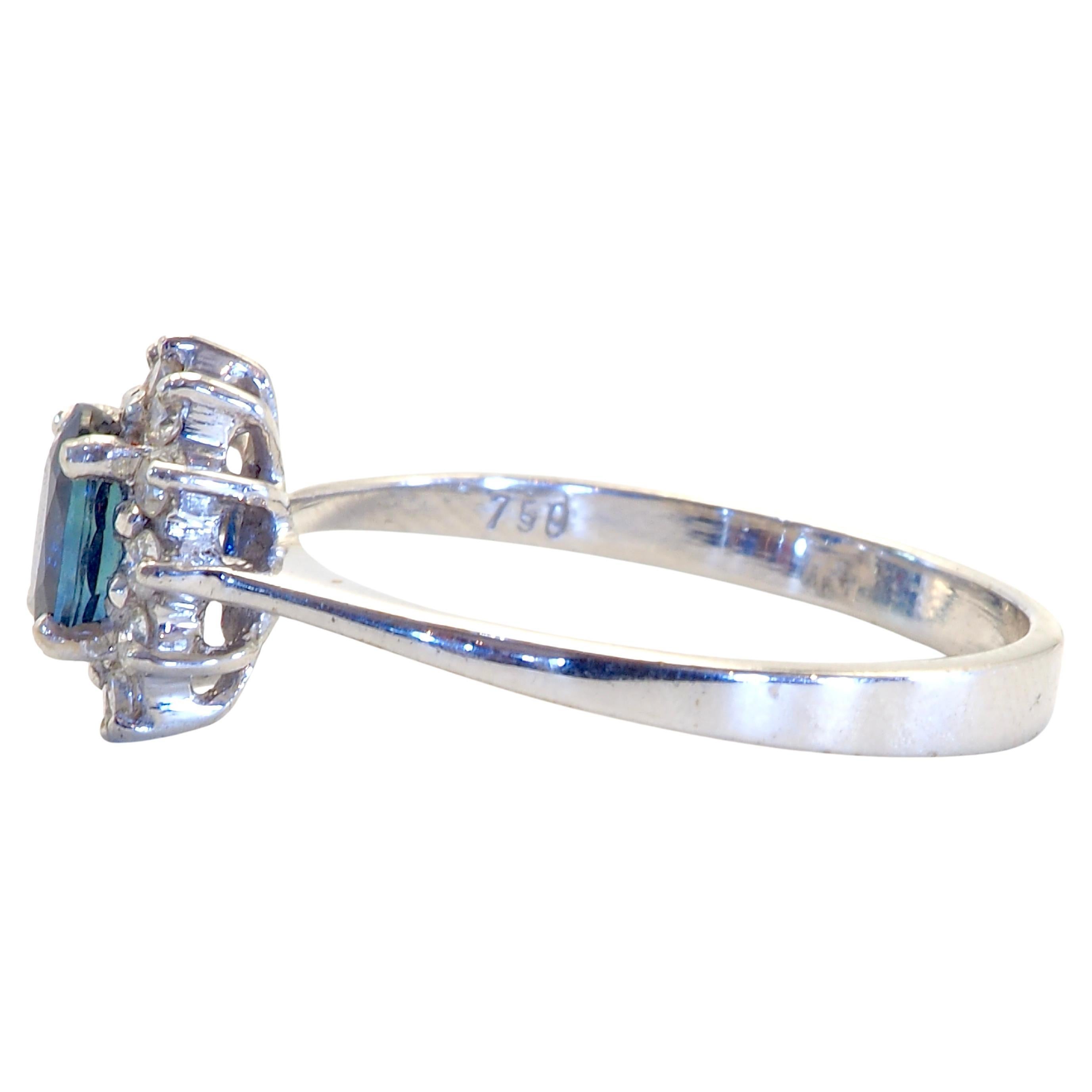 A fine blue sapphire ring in a contemporary sunburst halo design. Petite sapphire with awesome vivid blue color with high clarity and surrounded by brilliant and decent size diamonds. Perfect for wearing every day. 

Product Details:

Metal: 18k