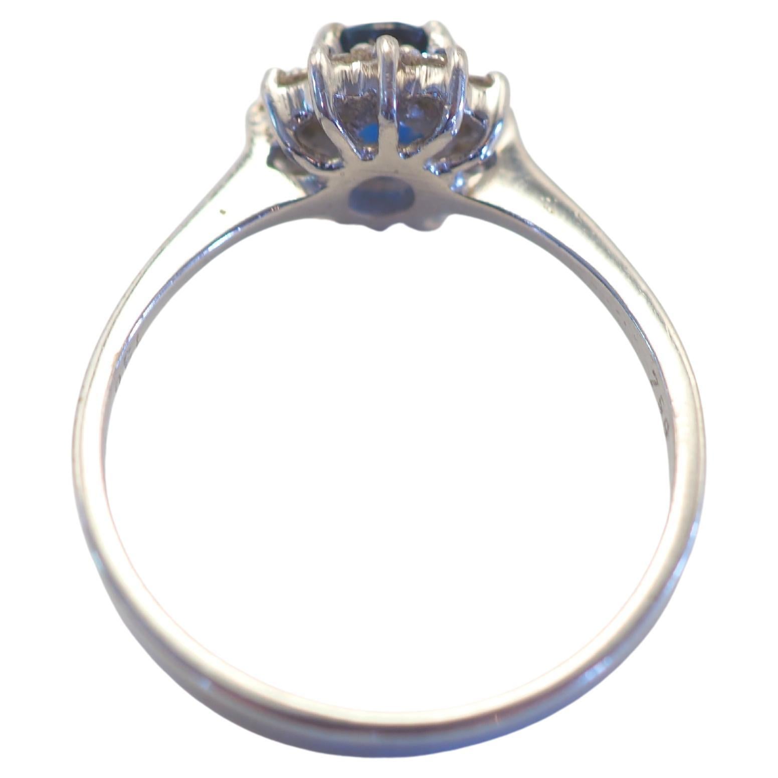 Oval Cut 18K White Gold 0.74ct Blue Sapphire & 0.20ct Diamond Fine Sunburst Ring For Sale